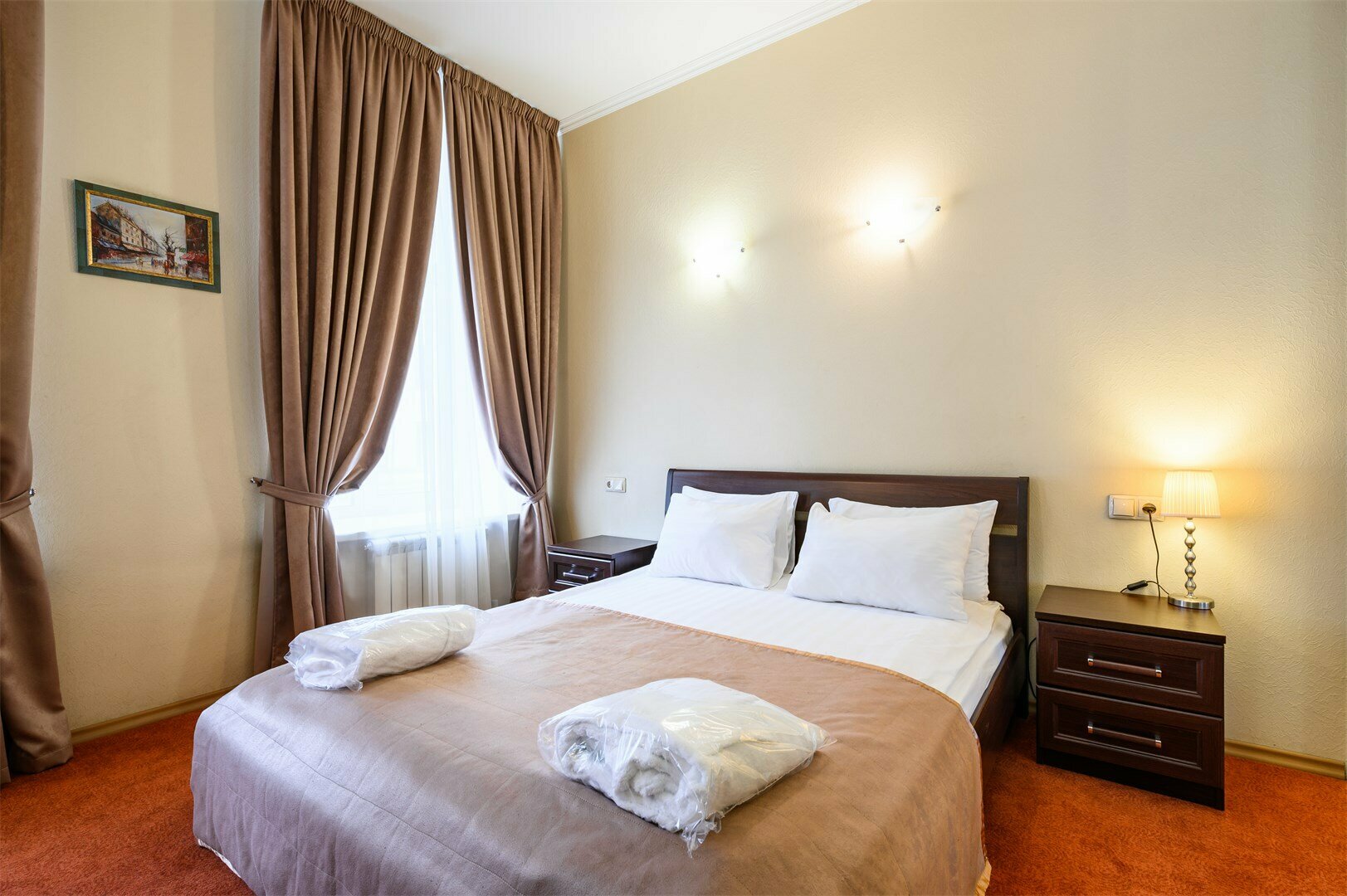 Улучшенная двухместная комната с 1 или 2 кроватями и диваном-кроватью