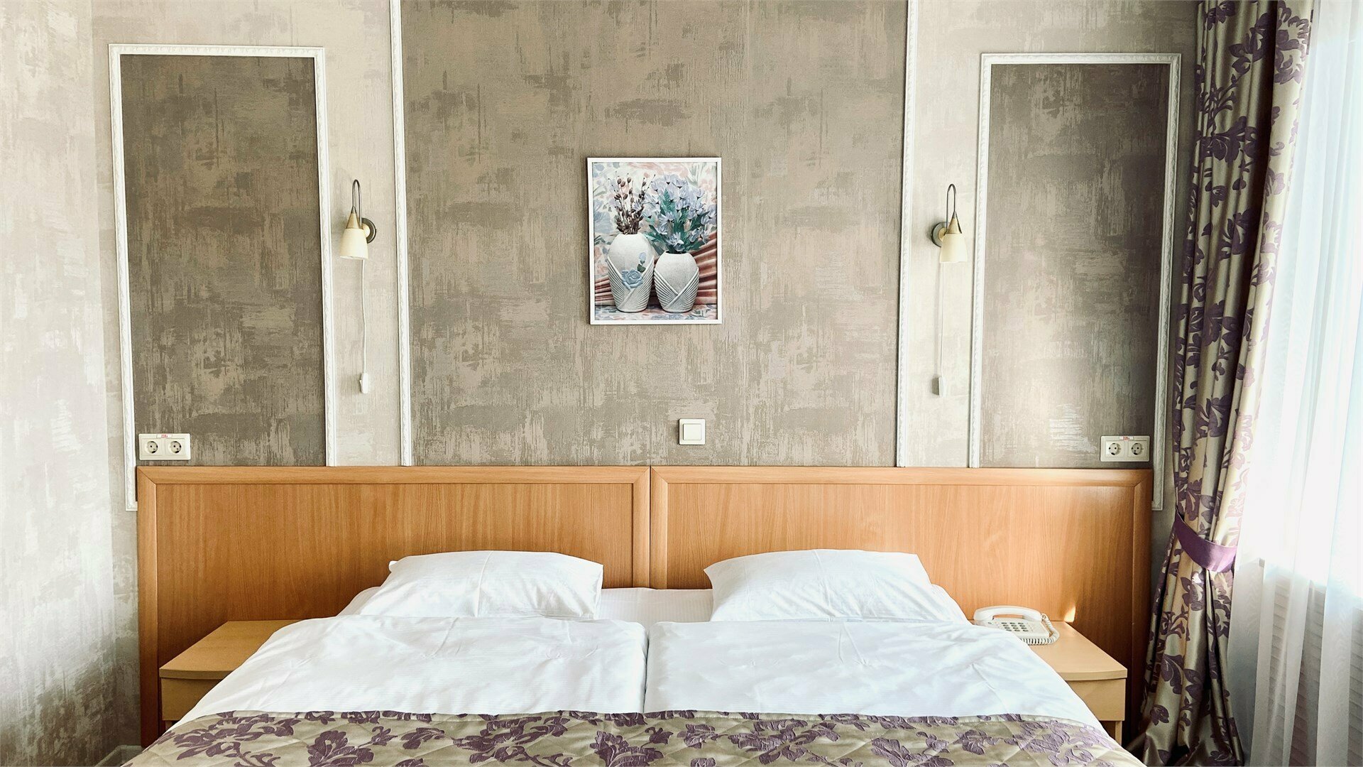 Улучшенный о одной двухспальной или двумя односпальными кроватями