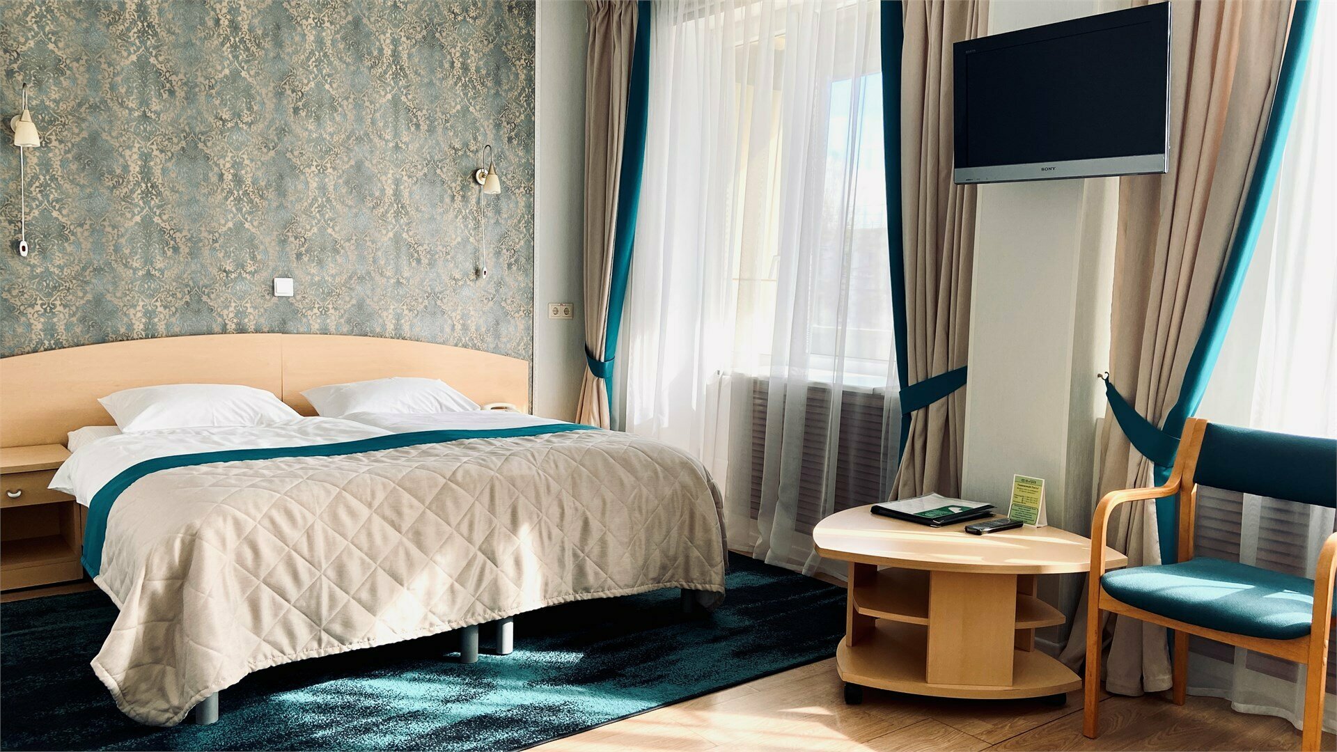 Улучшенный о одной двухспальной или двумя односпальными кроватями