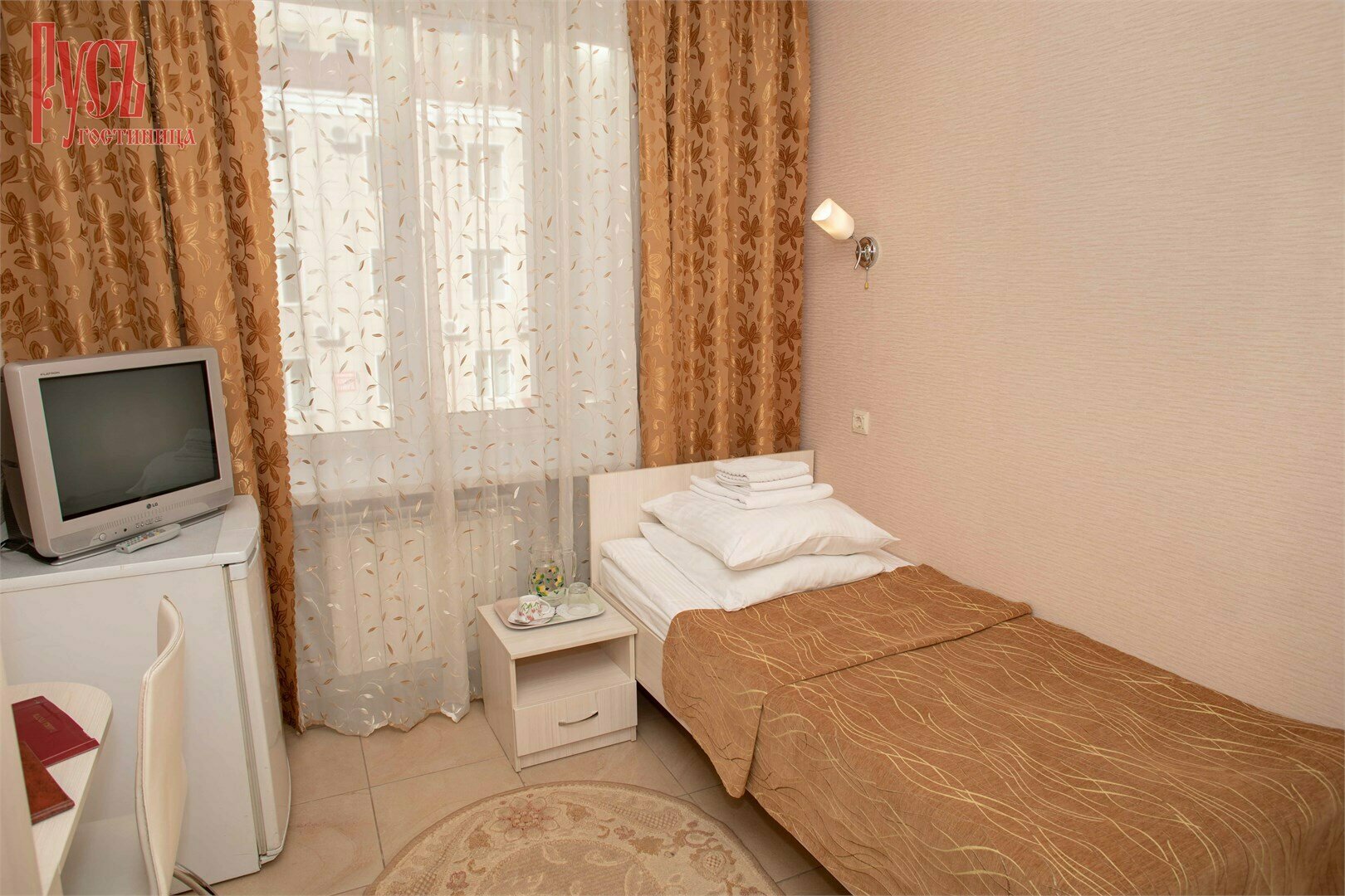 Одноместный номер с общим душем и туалетом