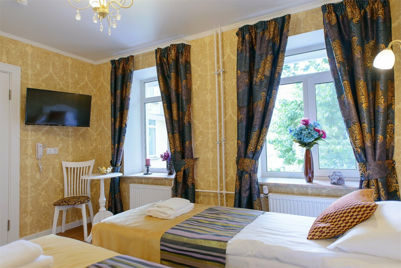 Улучшенный Двухместный (одна двуспальная или две односпальных кровати)