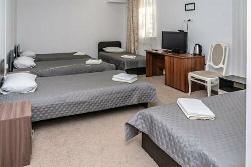 Стандарт Четырехместный с 4 односпальными кроватями