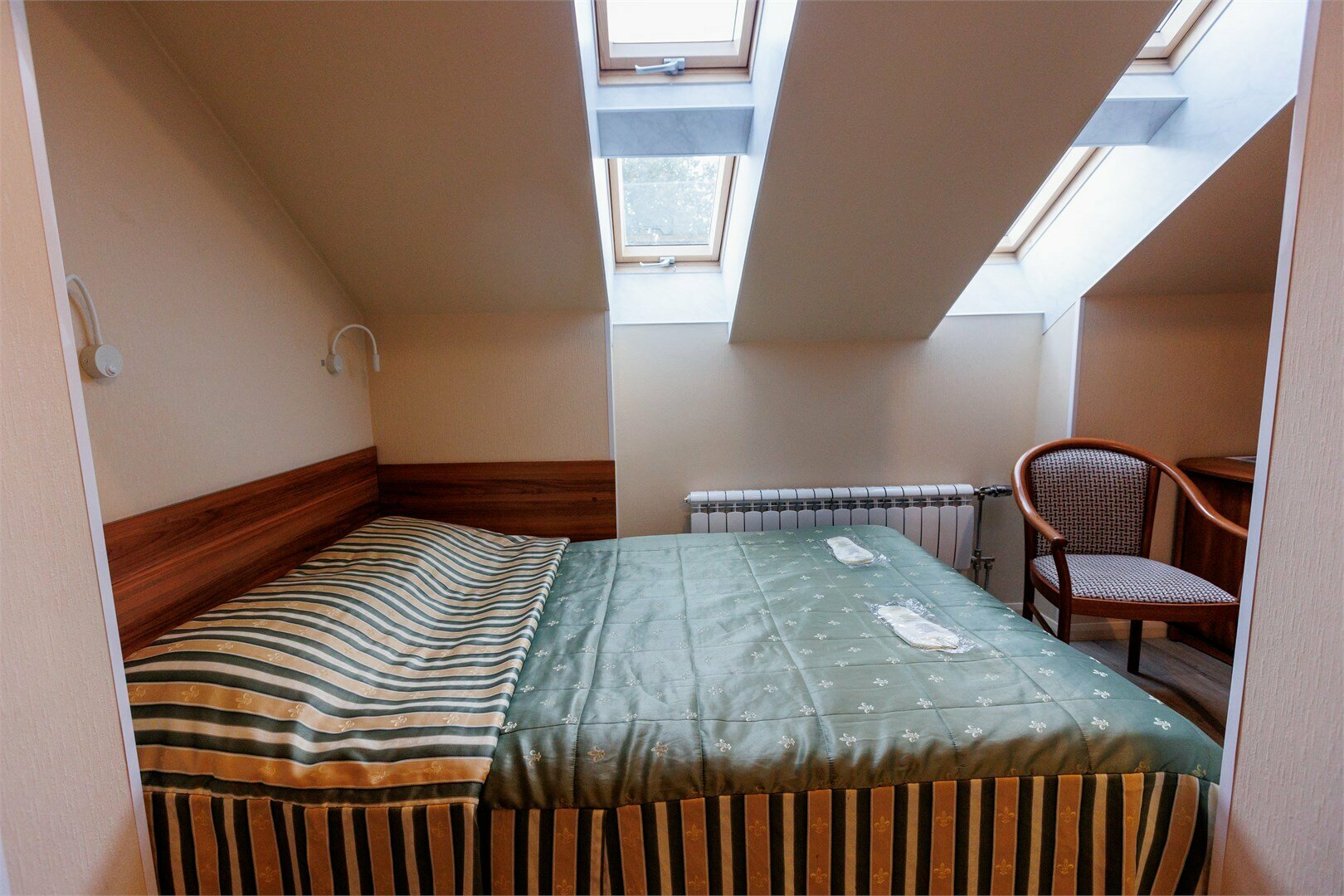 Четырехместный мансардный номер