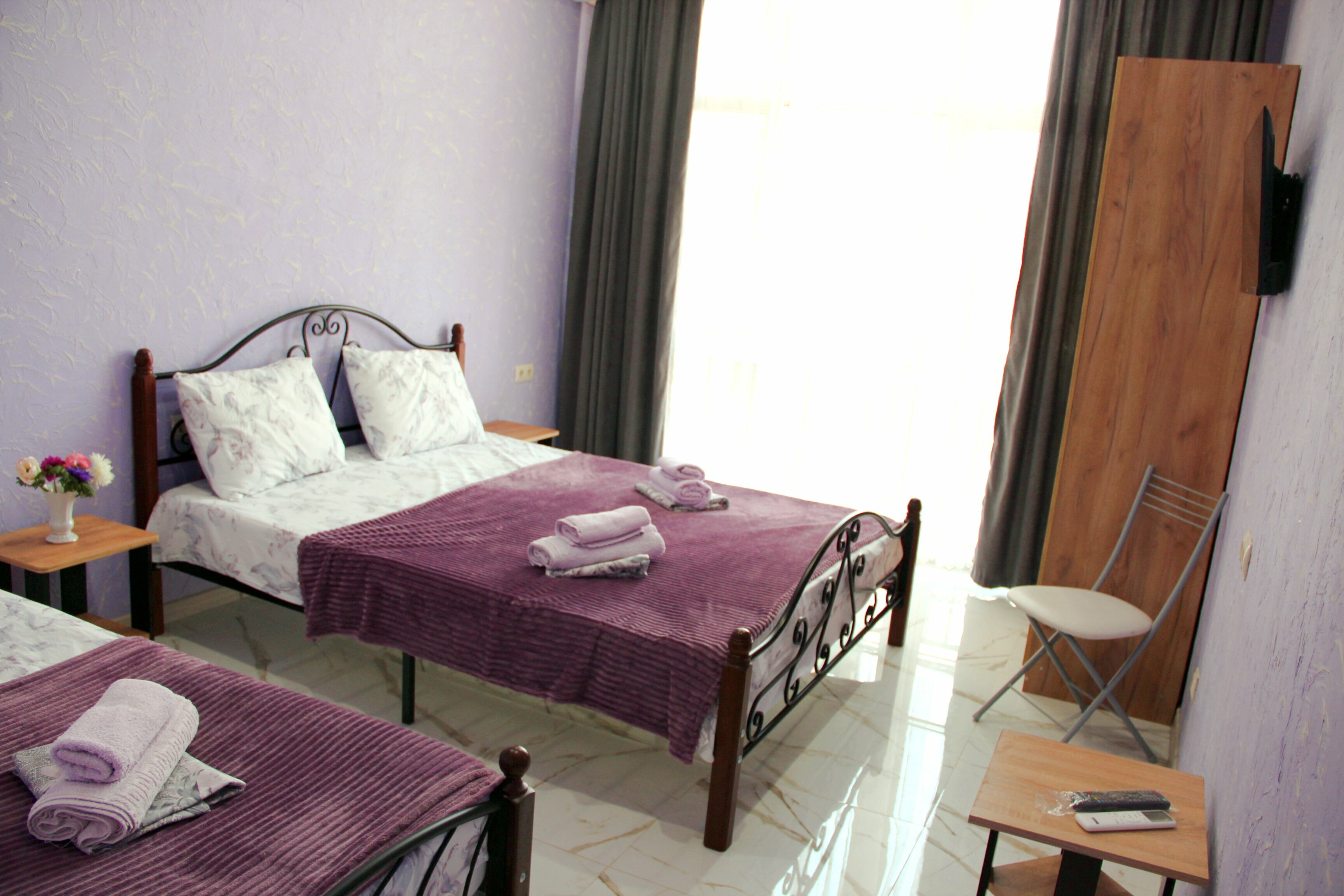 Трехместный номер с балконом