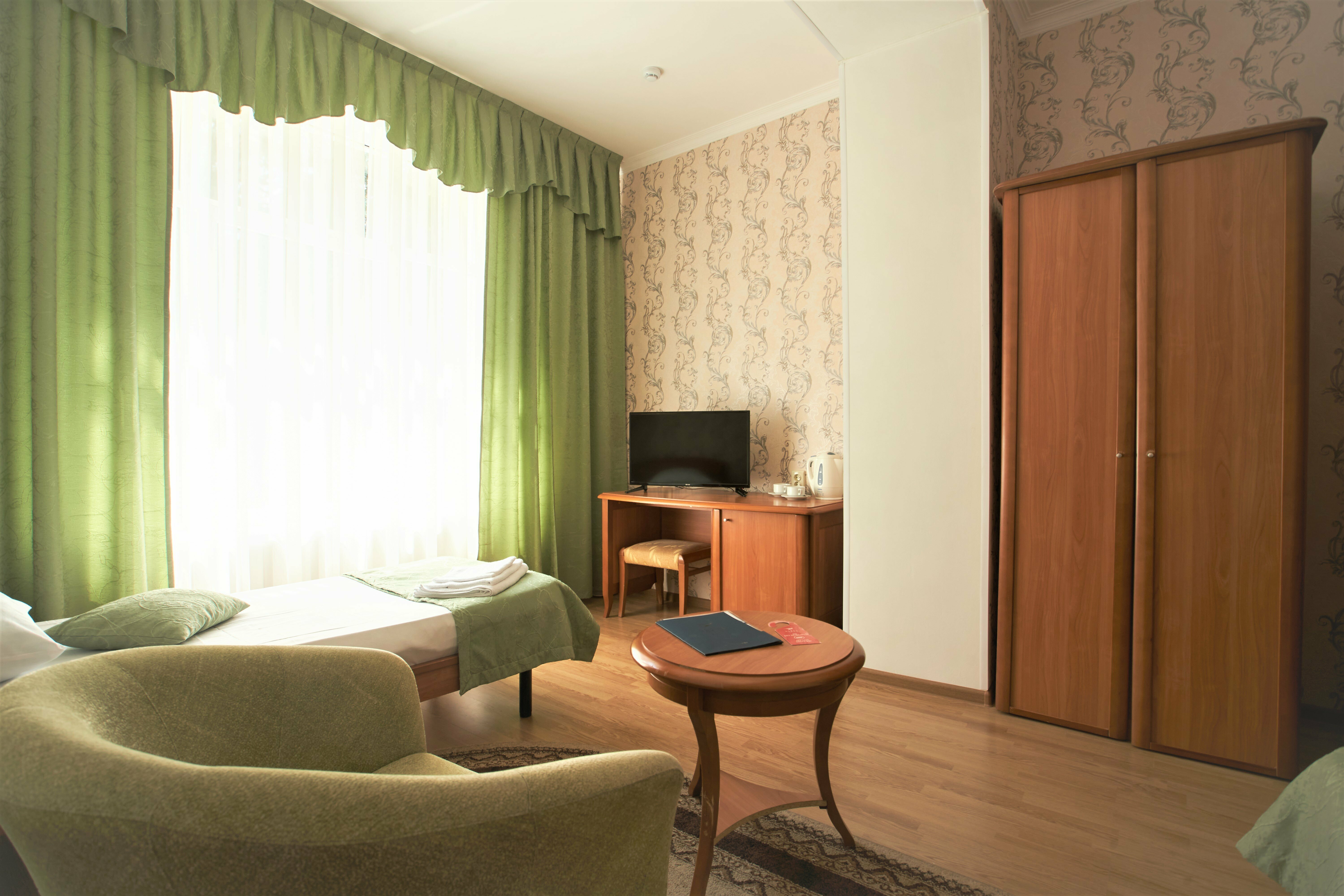 Просторный двухместный номер с 2 отдельными кроватями