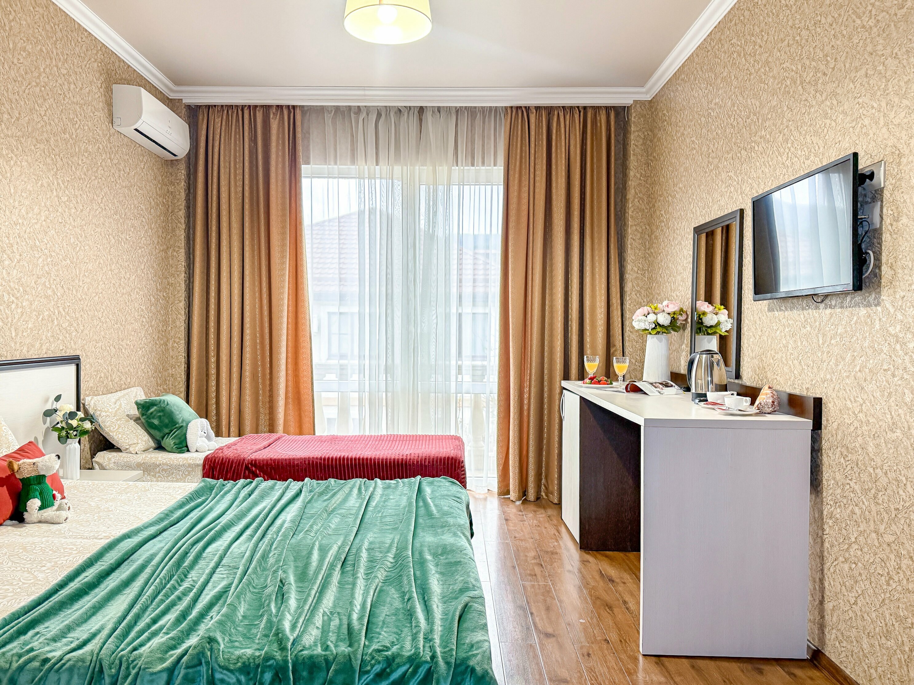 Трехместный номер Делюкс