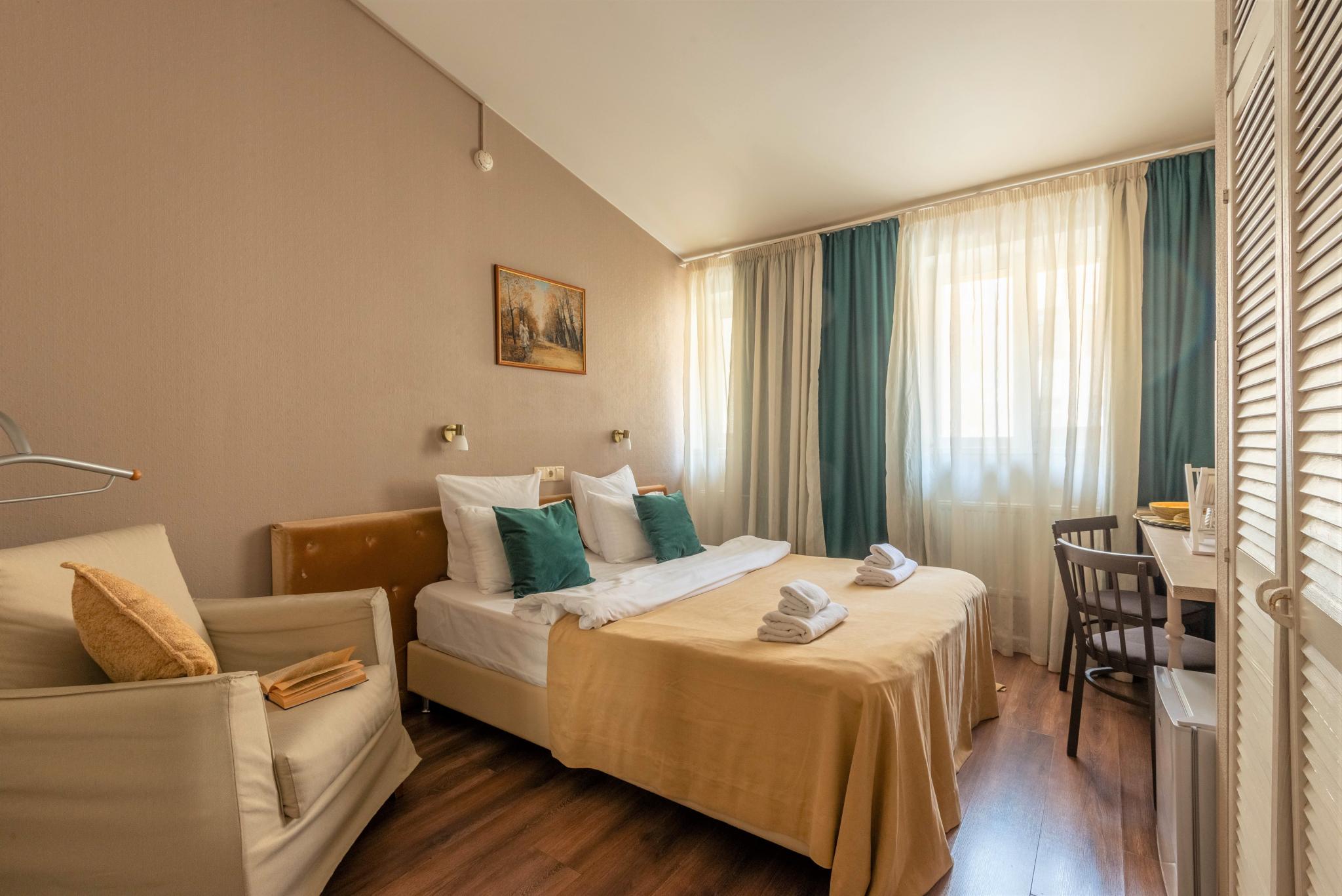 Номер стандарт с 1 двуспальной кроватью