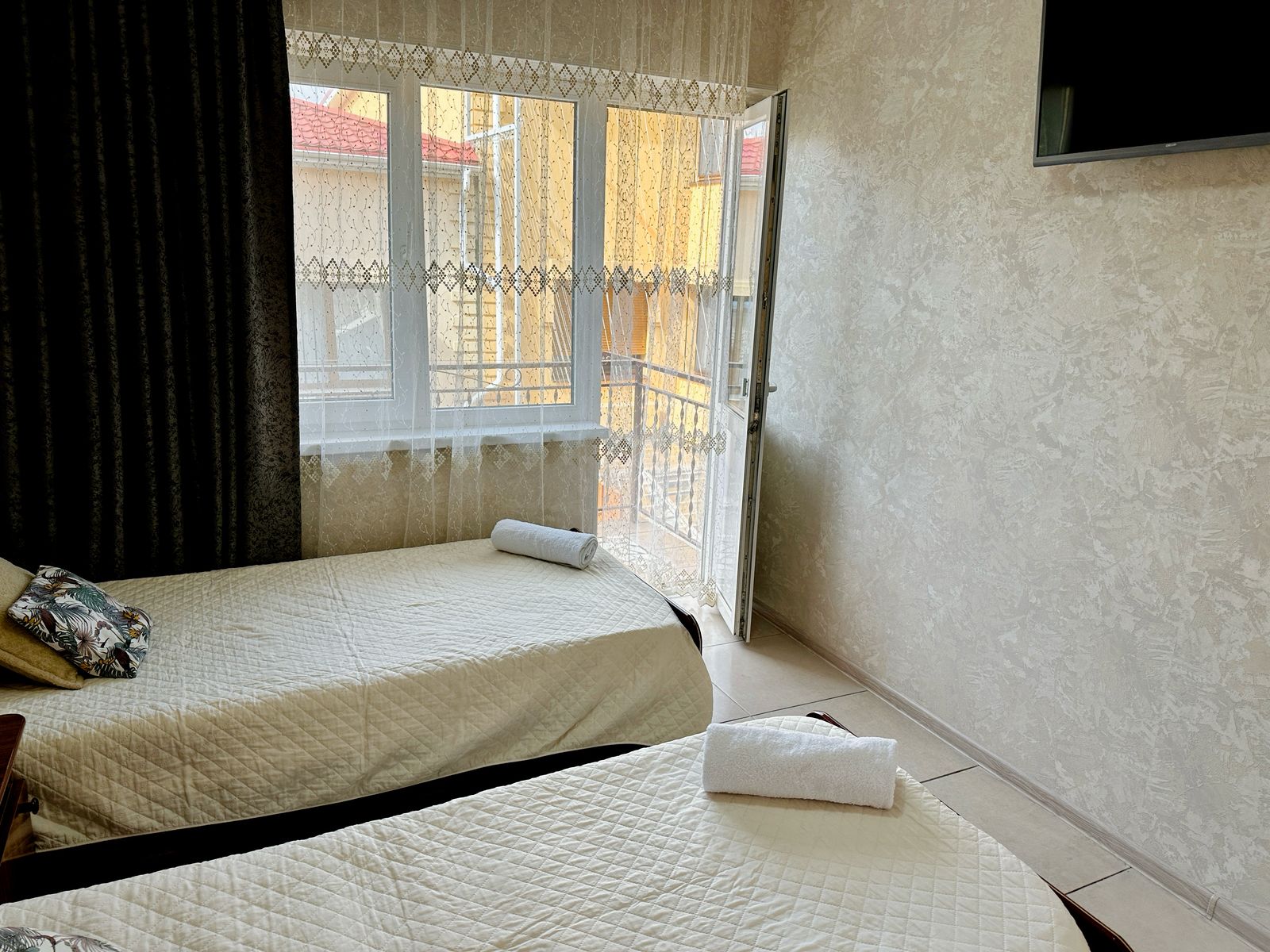 Двухместный номер с 2 отдельными кроватями и балконом