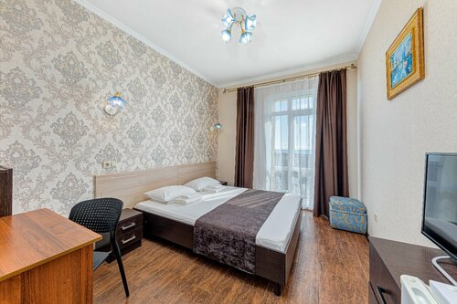 Улучшенный двухместный номер Делюкс с 1 кроватью или 2 отдельными кроватями в Валентин