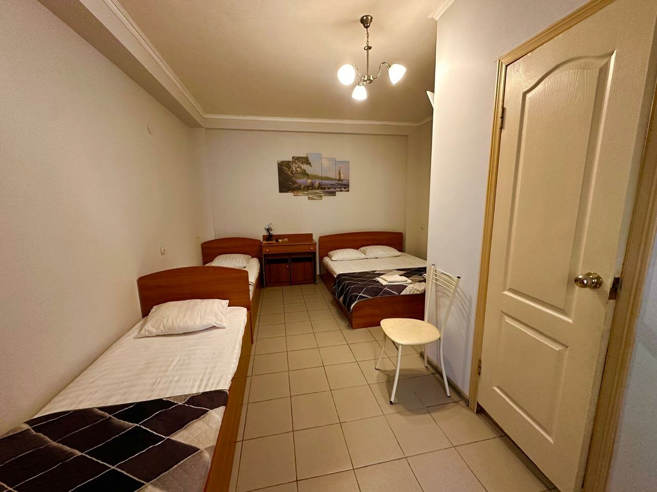 Улучшенный четырехместный номер