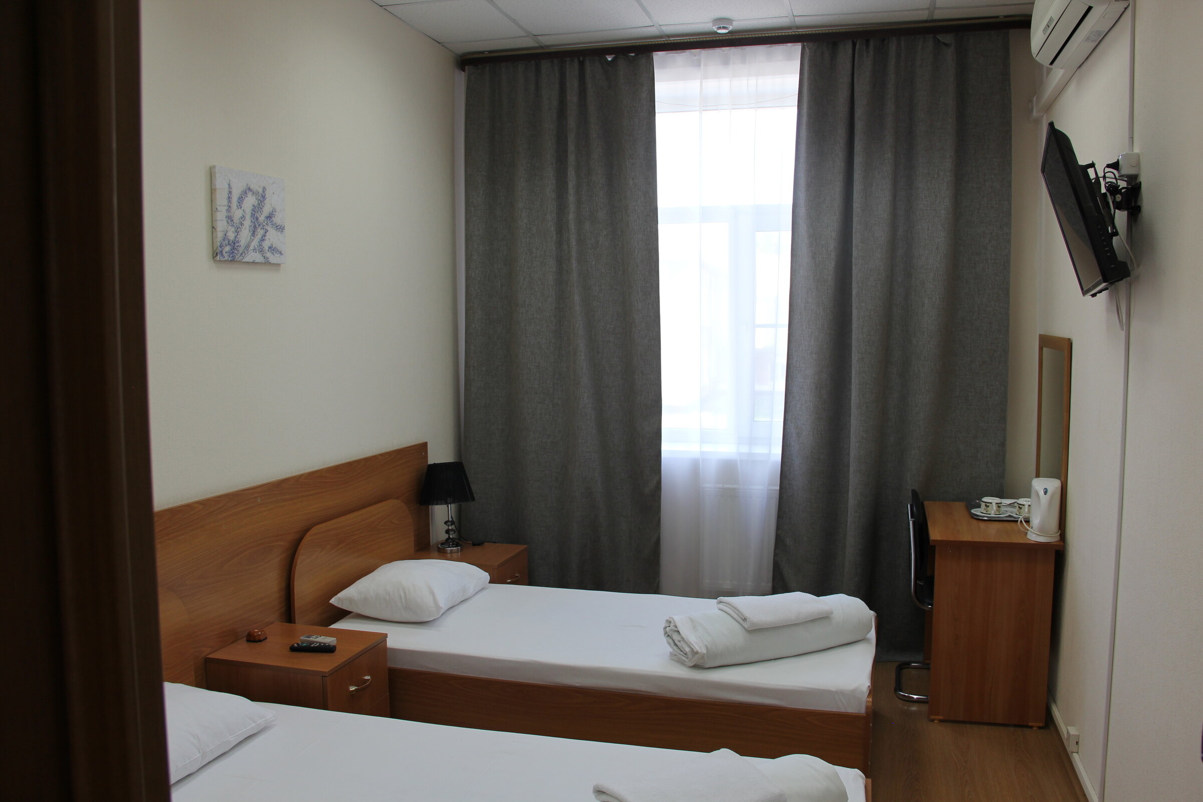 Двухместный номер с 2 отдельными кроватями и окном