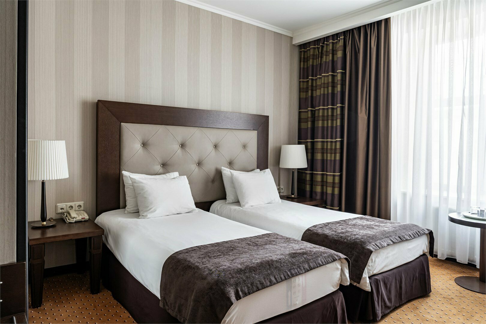 Улучшенный номер с одной большой или двумя раздельными кроватями