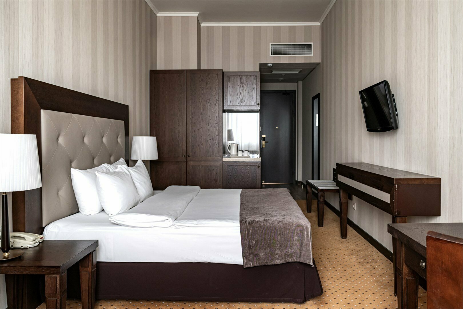 Представительский номер с одной большой или двумя раздельными кроватями