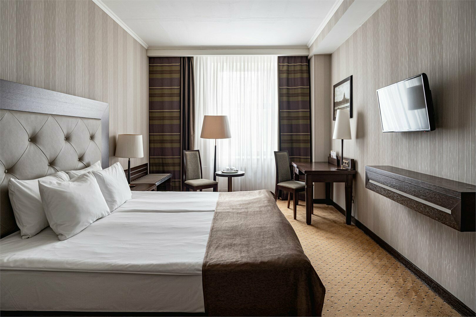 Улучшенный номер с одной большой или двумя раздельными кроватями