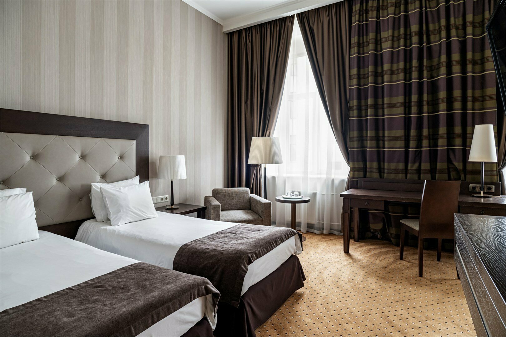 Улучшенный номер с одной большой или двумя раздельными кроватями