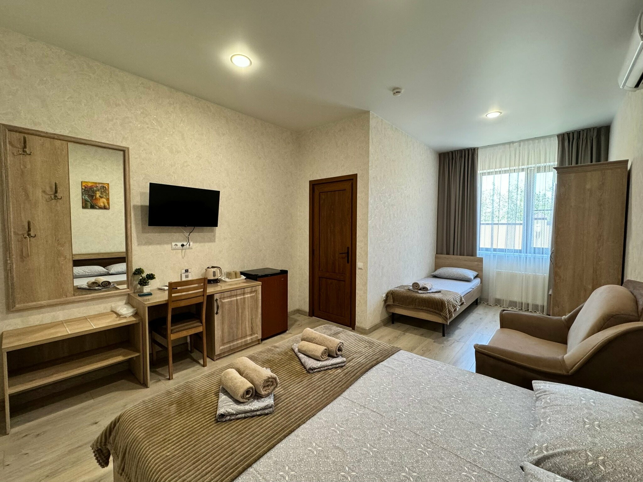 Четырехместный номер Делюкс