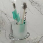 Комната в двухкомнатном номере с двуспальной кроватью и общим санузлом в Семейный Отдых