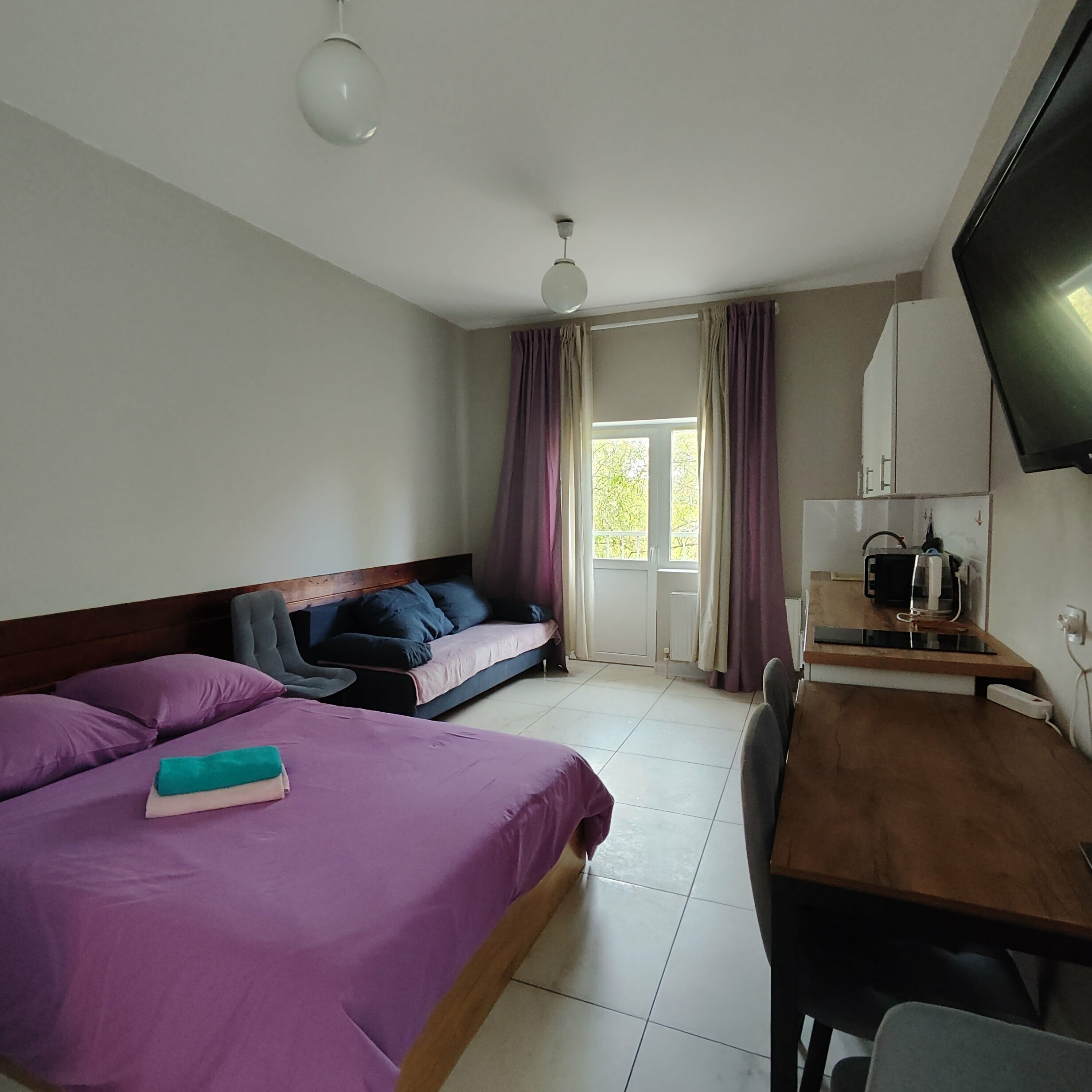 Семейные апартаменты с кухней и балконом