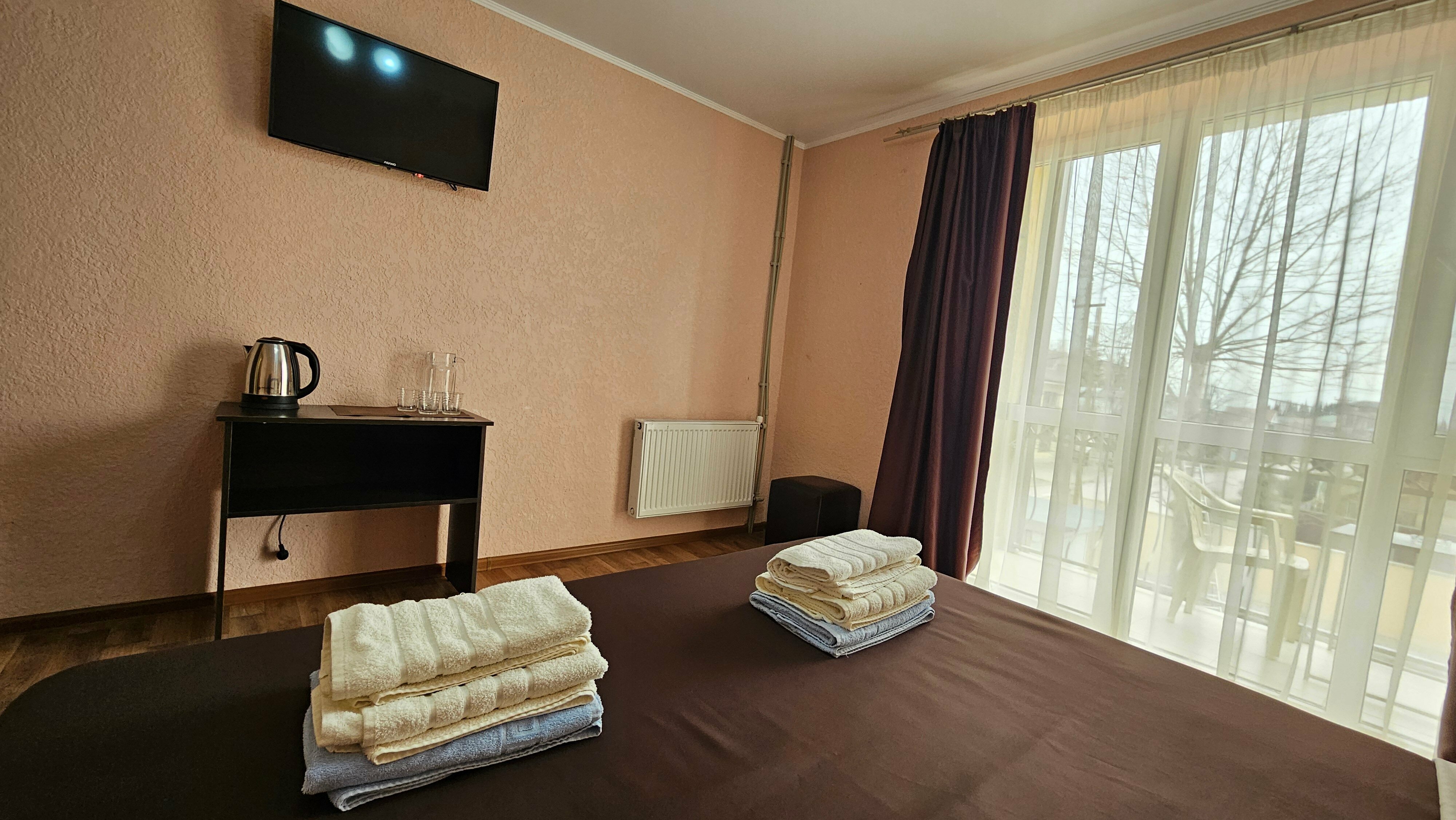 Трехместный номер с балконом