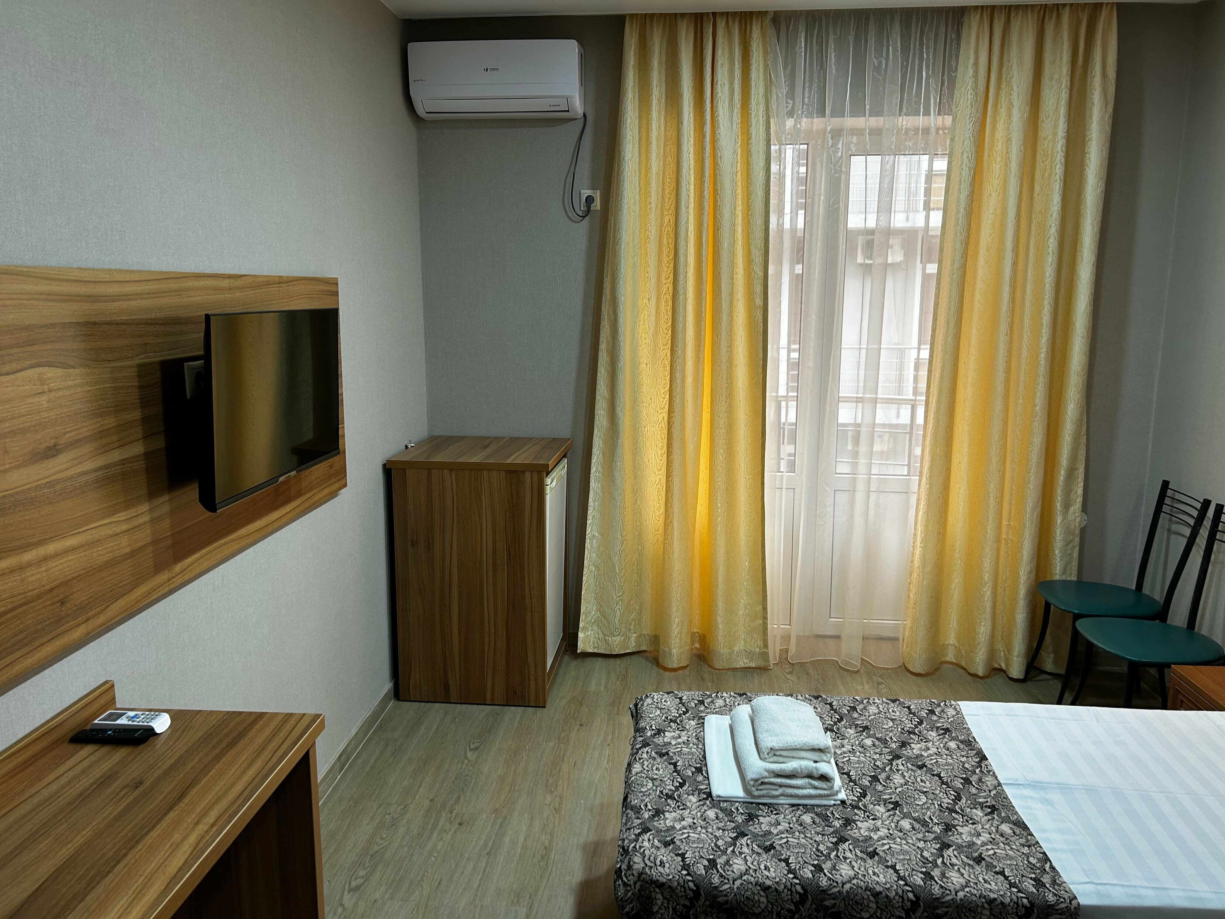 Двухместный номер с 2 отдельными кроватями и балконом