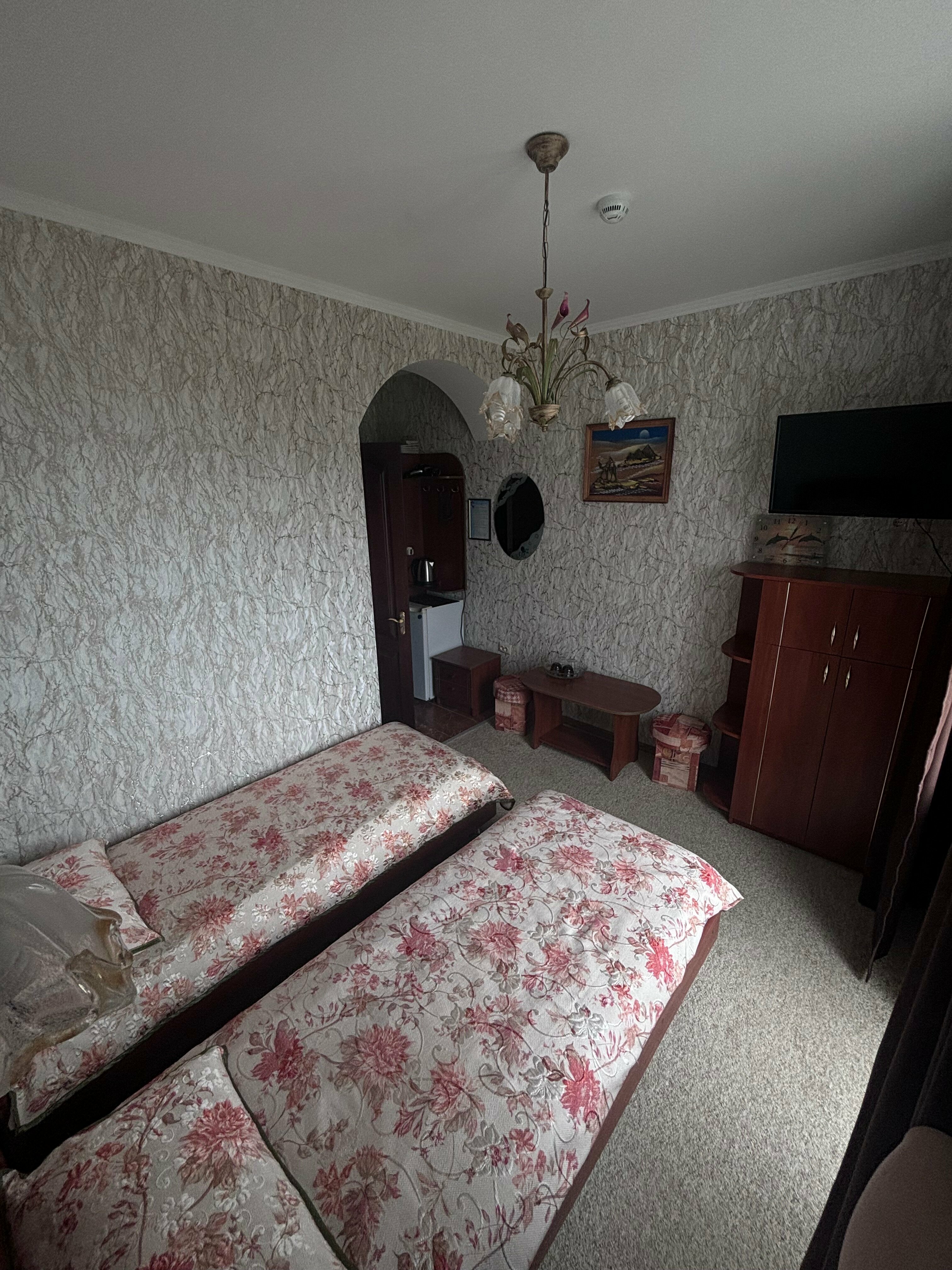 Двухместный номер с 1 кроватью или 2 отдельными кроватями и боковым видом на море