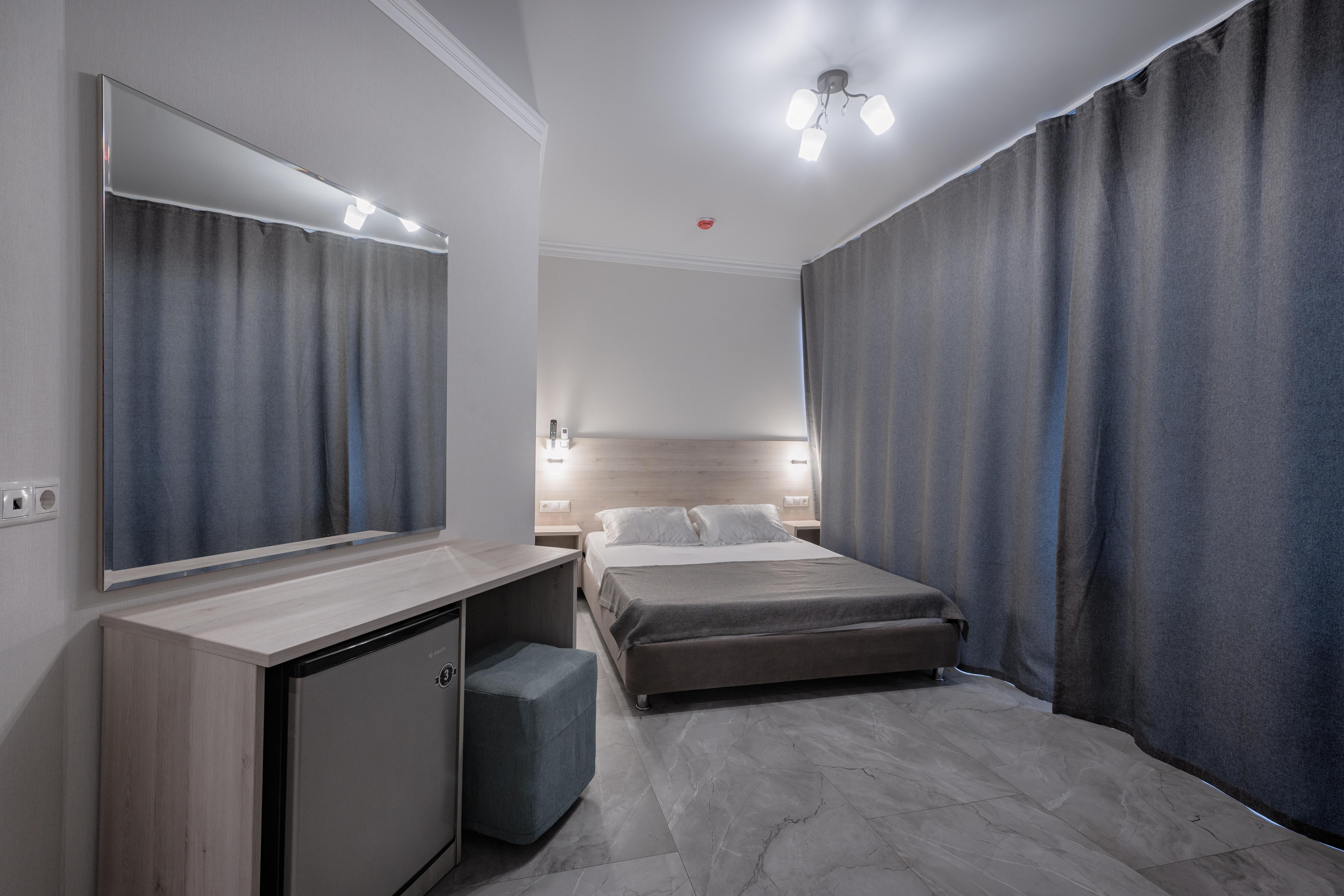 Трехместный номер с балконом