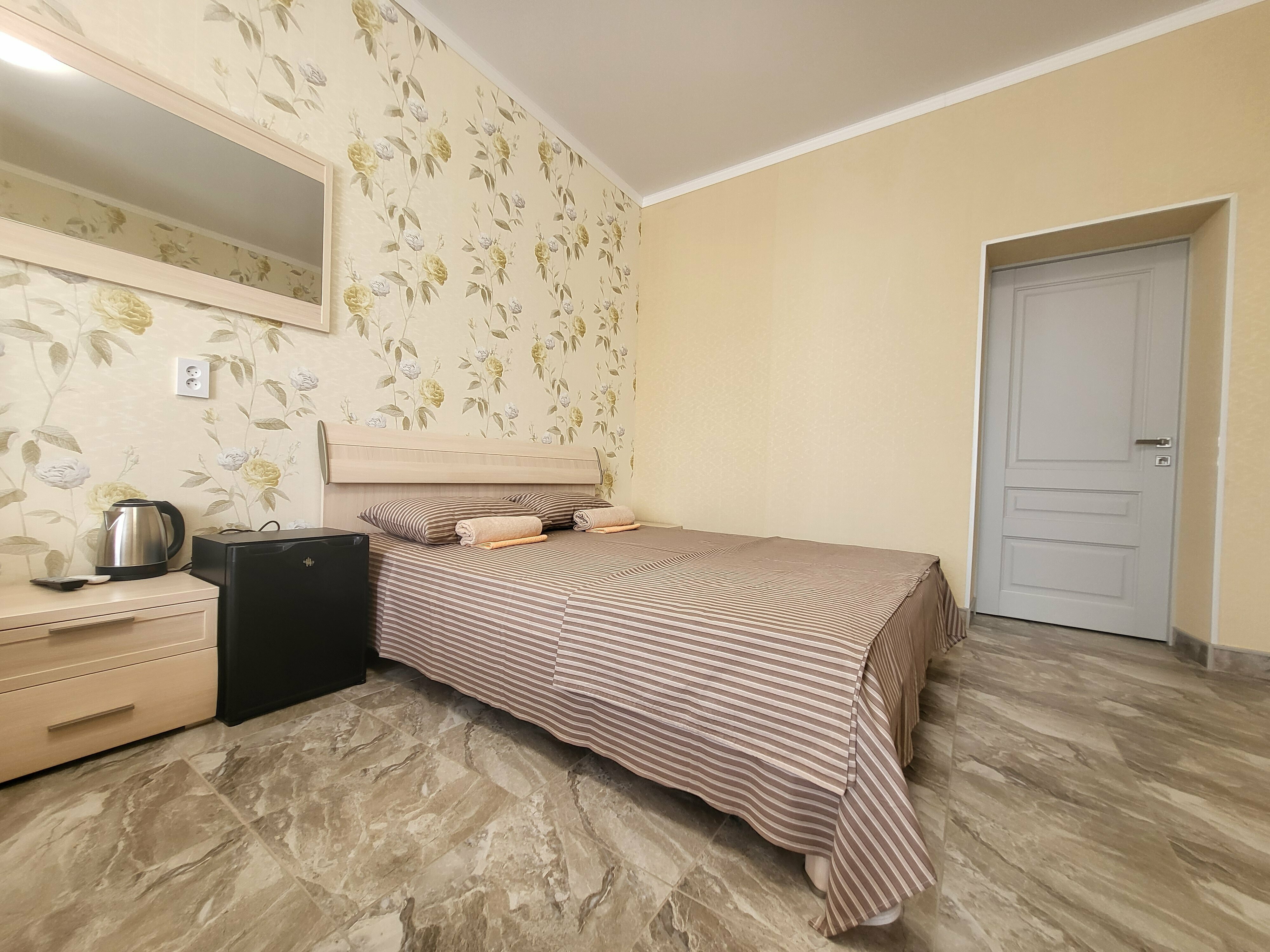 Улучшенный четырехместный номер