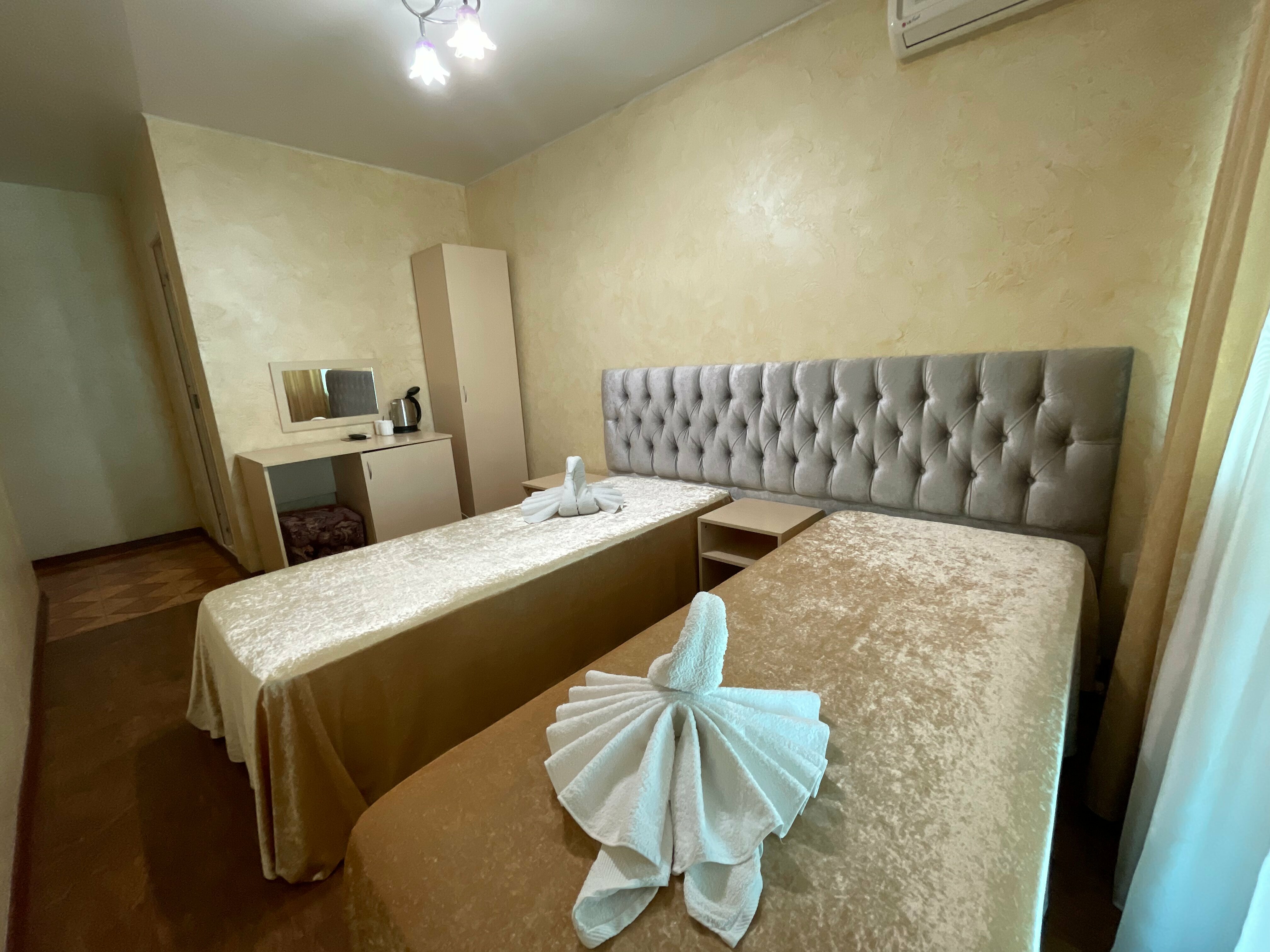 Двухместная комната с балконом (2 односпальные кровати)