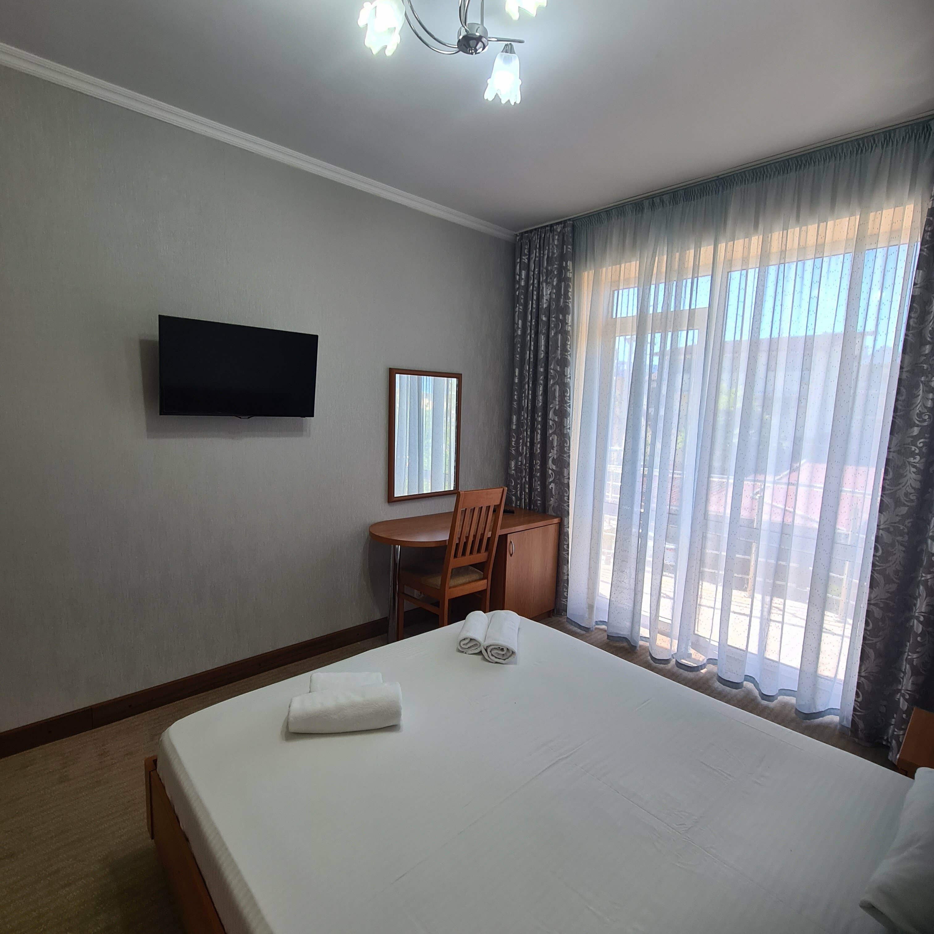 Двухместный номер Делюкс с 1 кроватью или 2 отдельными кроватями и балконом