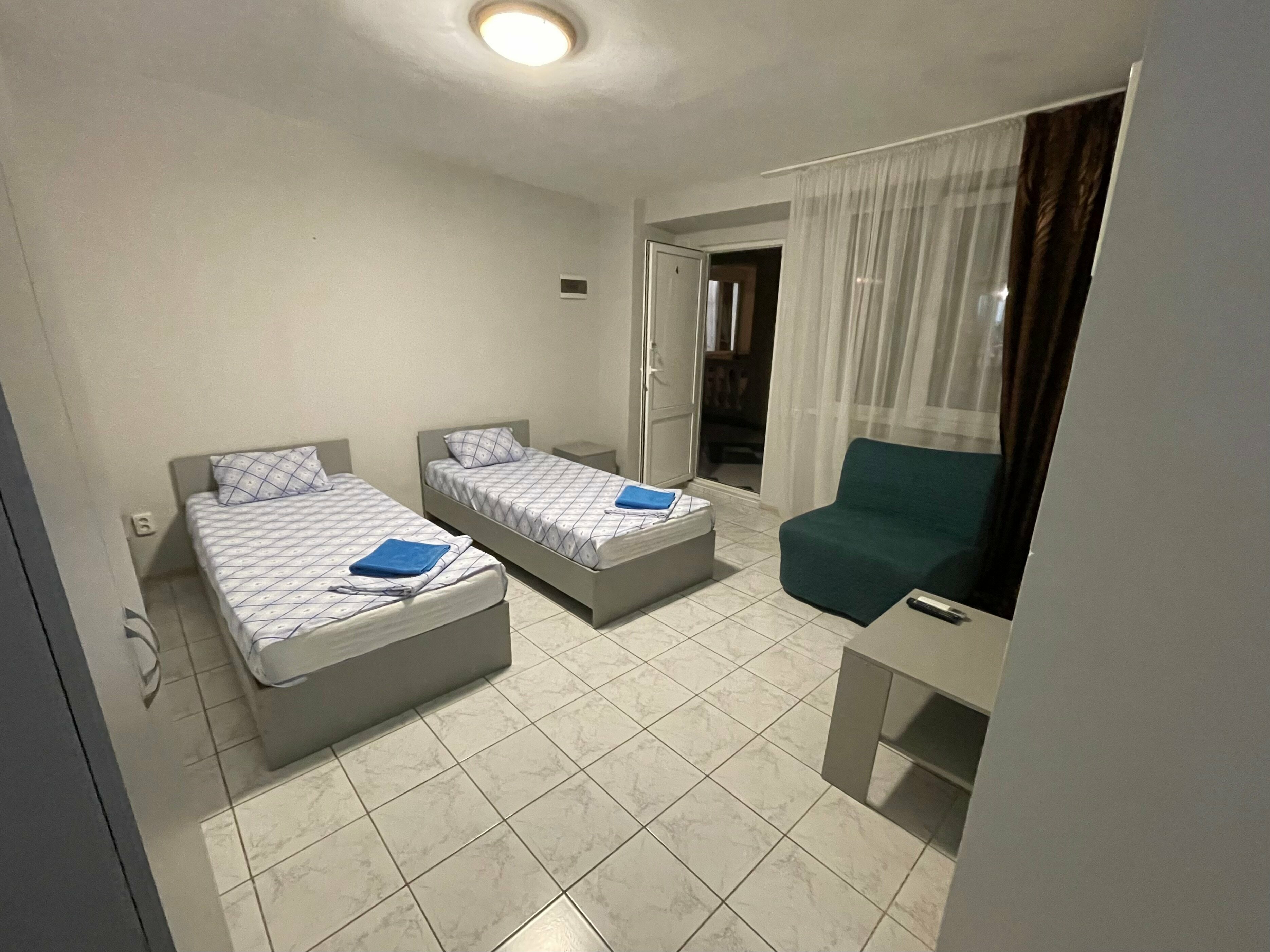 Двухместный номер эконом-класса с 1 кроватью или 2 отдельными кроватями