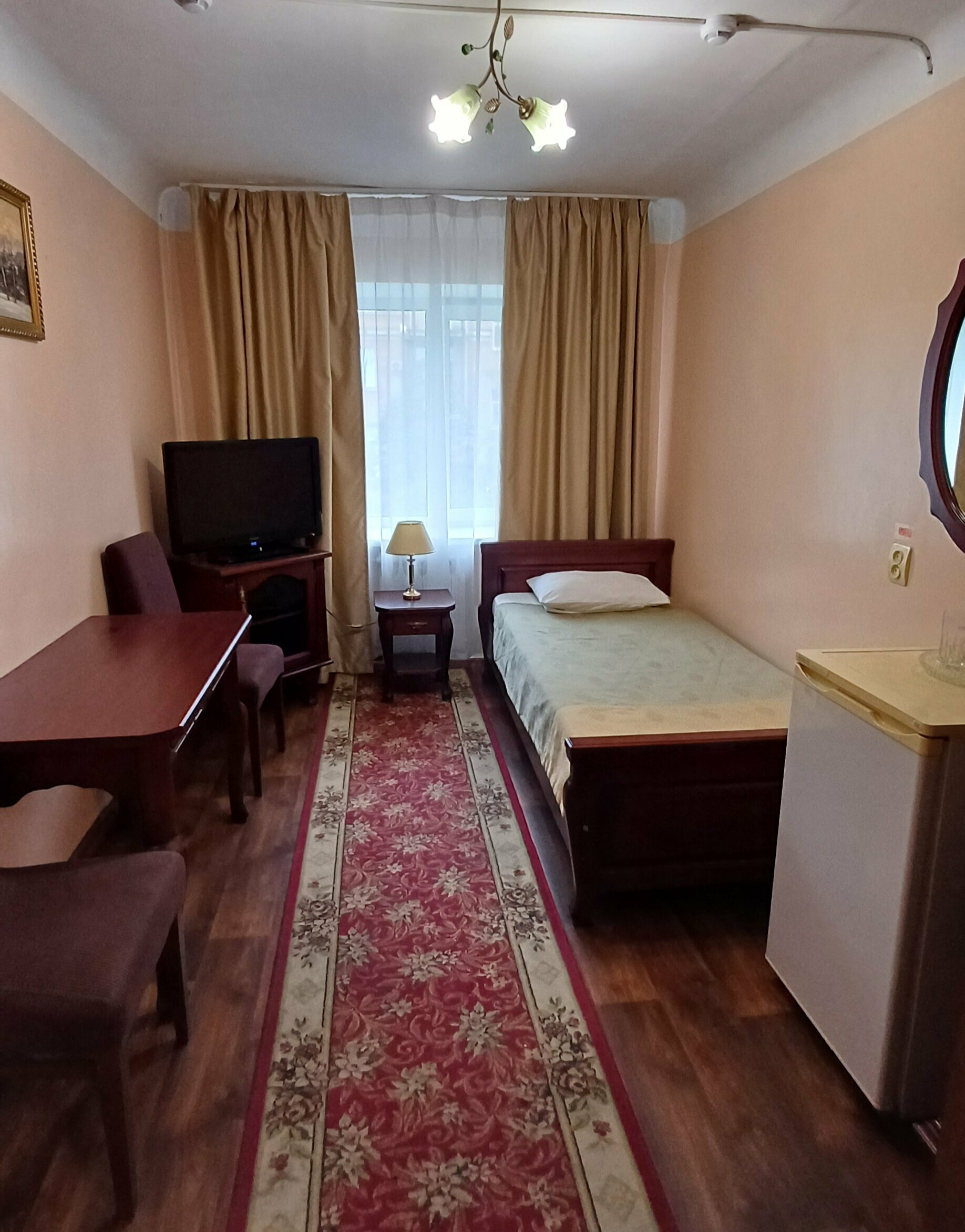 Одноместный номер с общим душем и туалетом