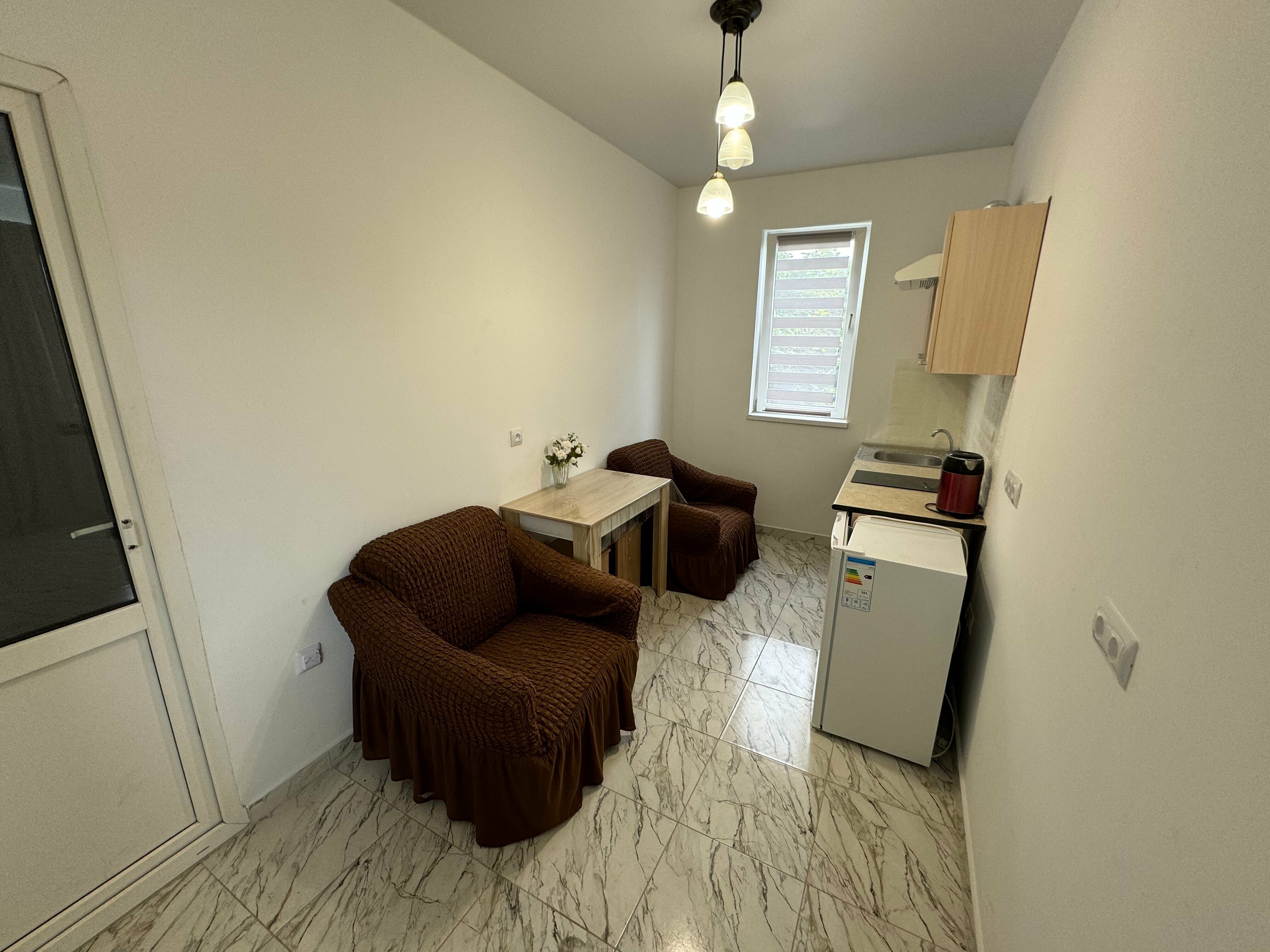 Номер-студия с кроватью размера "king-size" и диван-кроватью