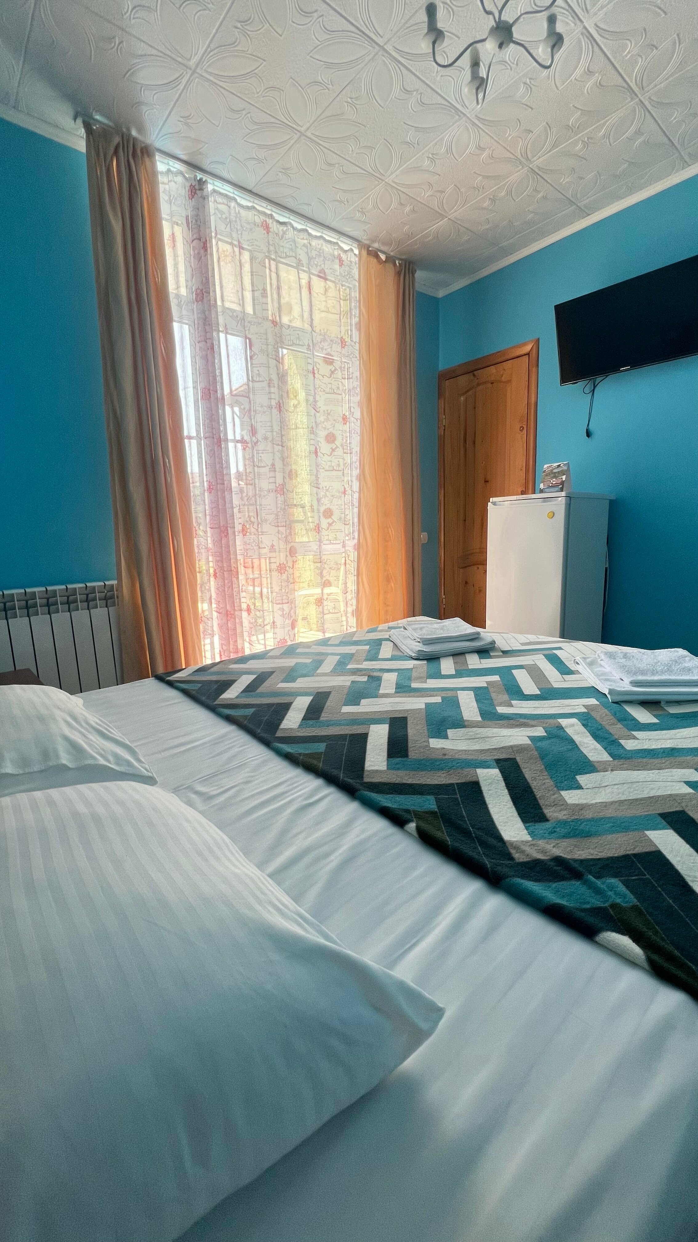 Четырехместный двухкомнатный номер с балконом на бассейн №1