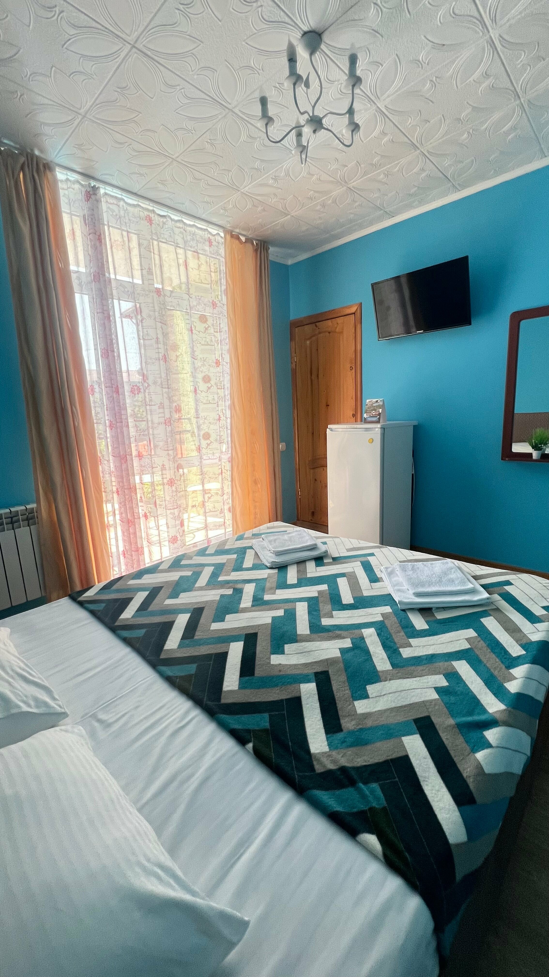 Четырехместный двухкомнатный номер с балконом на бассейн №1