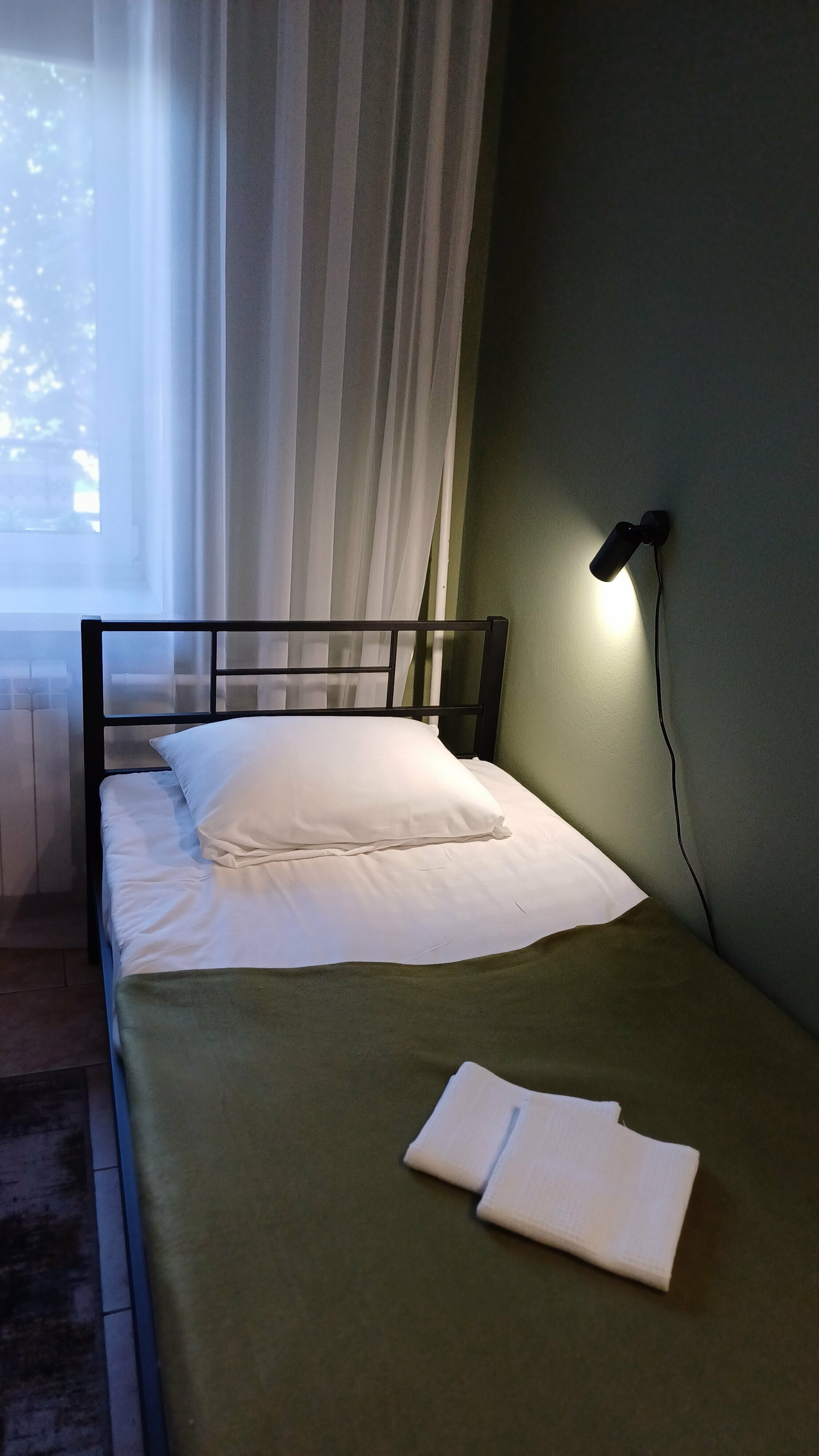 Одноместный номер с общим душем и туалетом