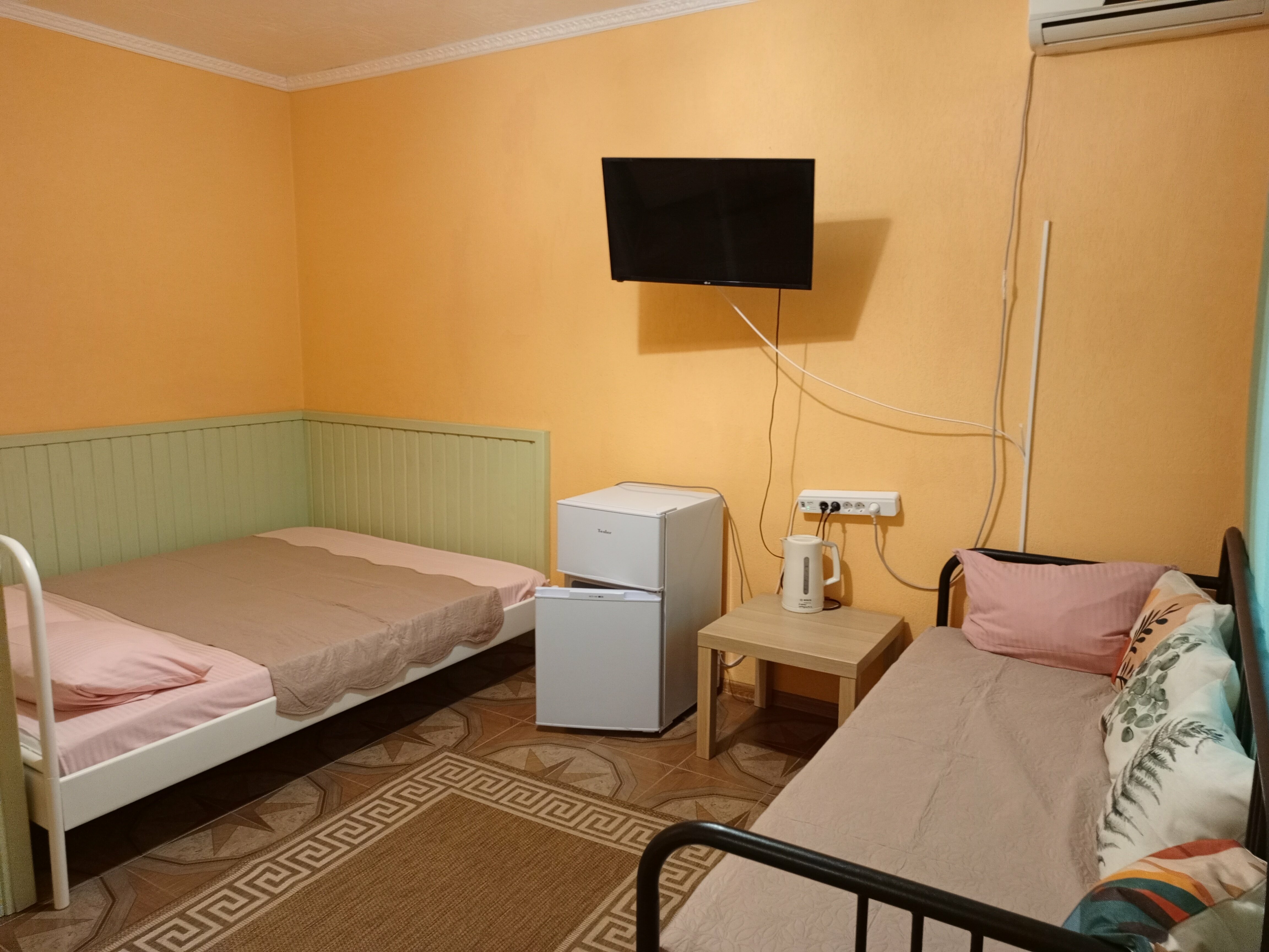 Семейный номер с видом на сад