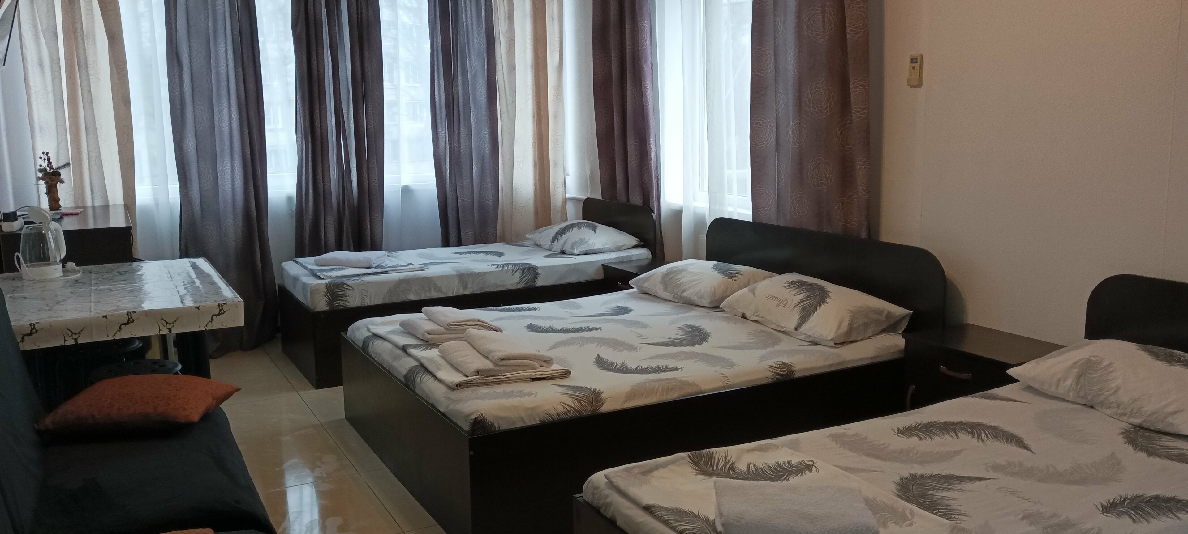 Семейный номер с видом на сад