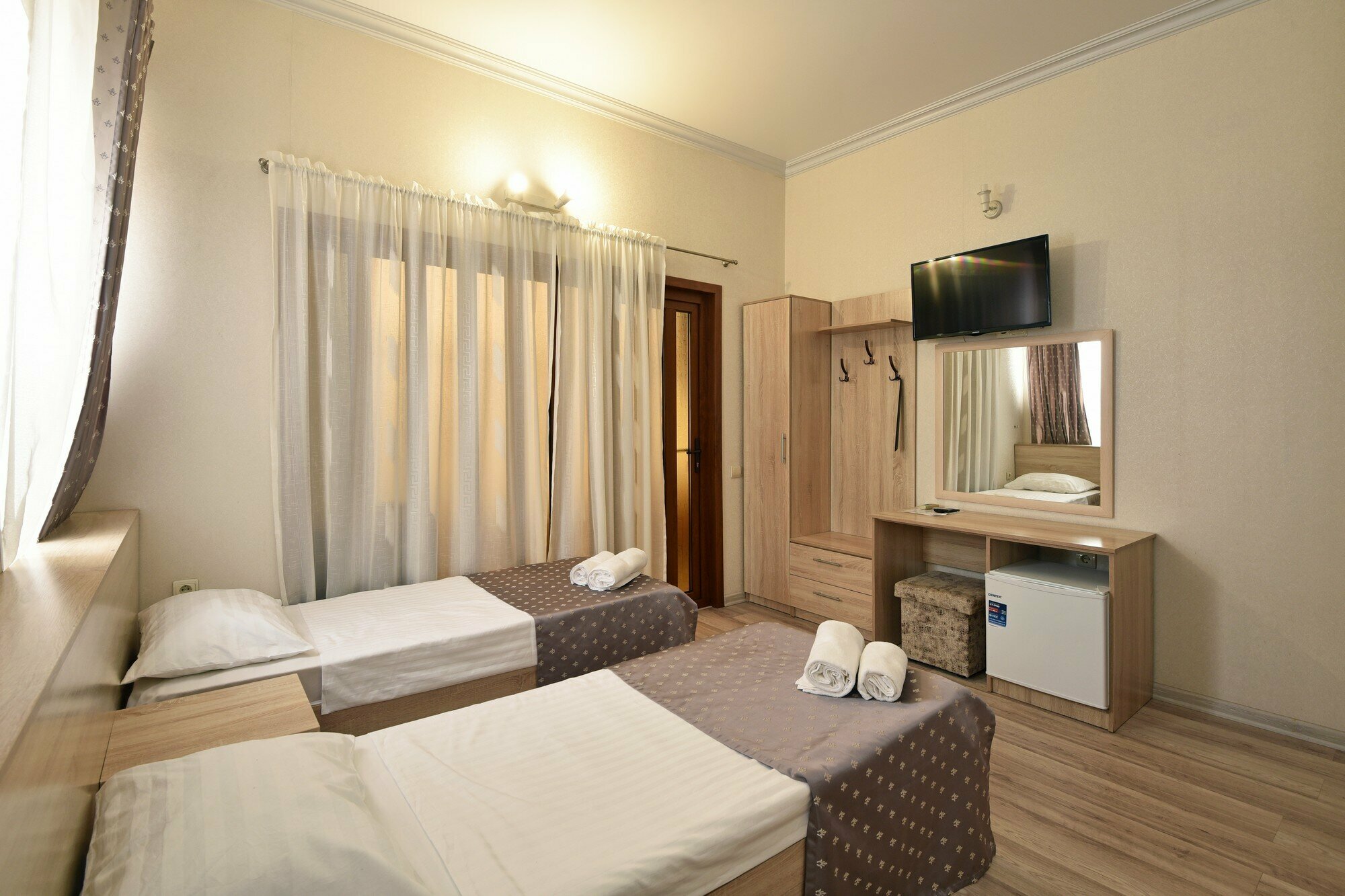 Улучшенный четырехместный номер