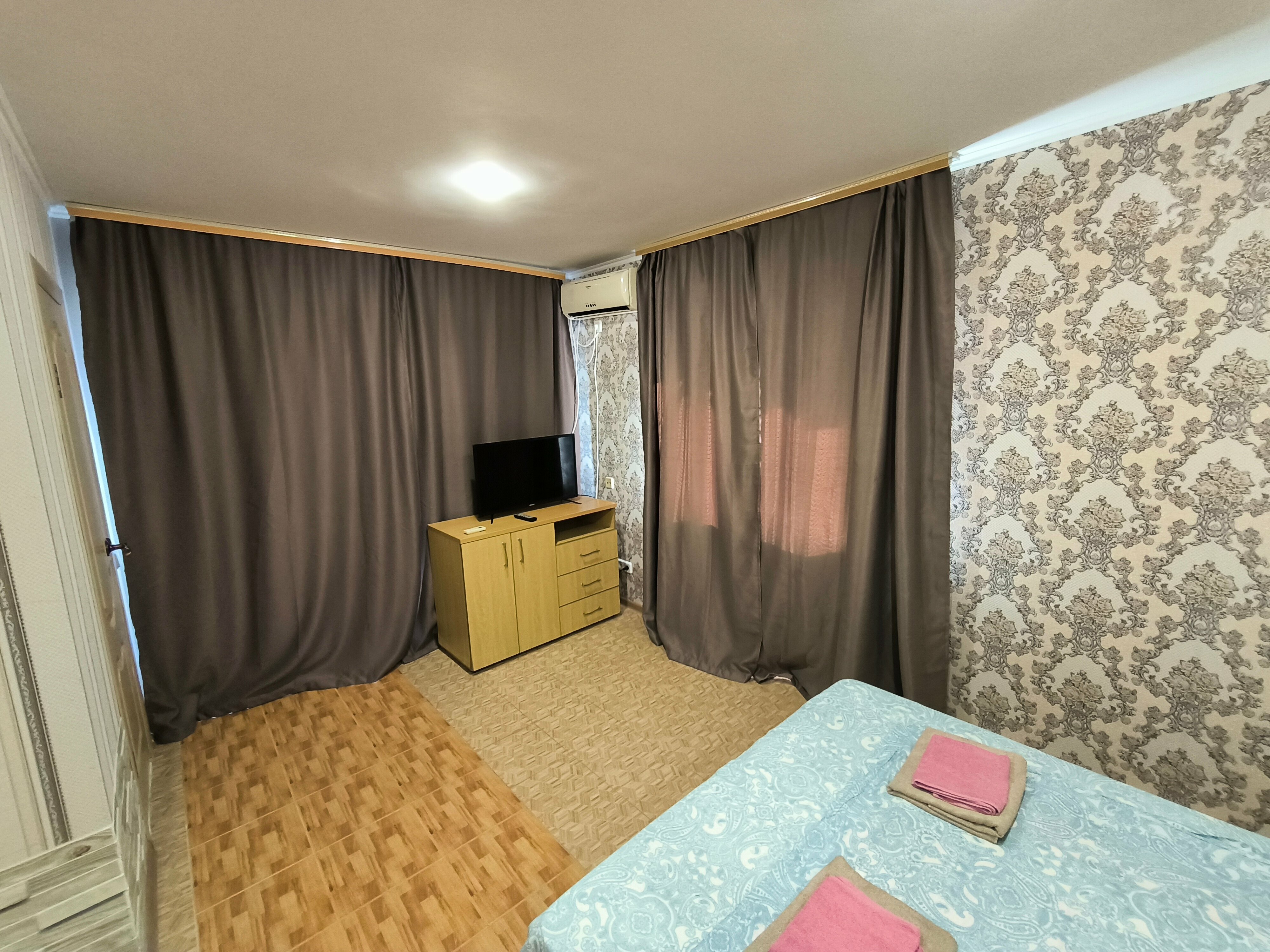 Трехместный номер с балконом