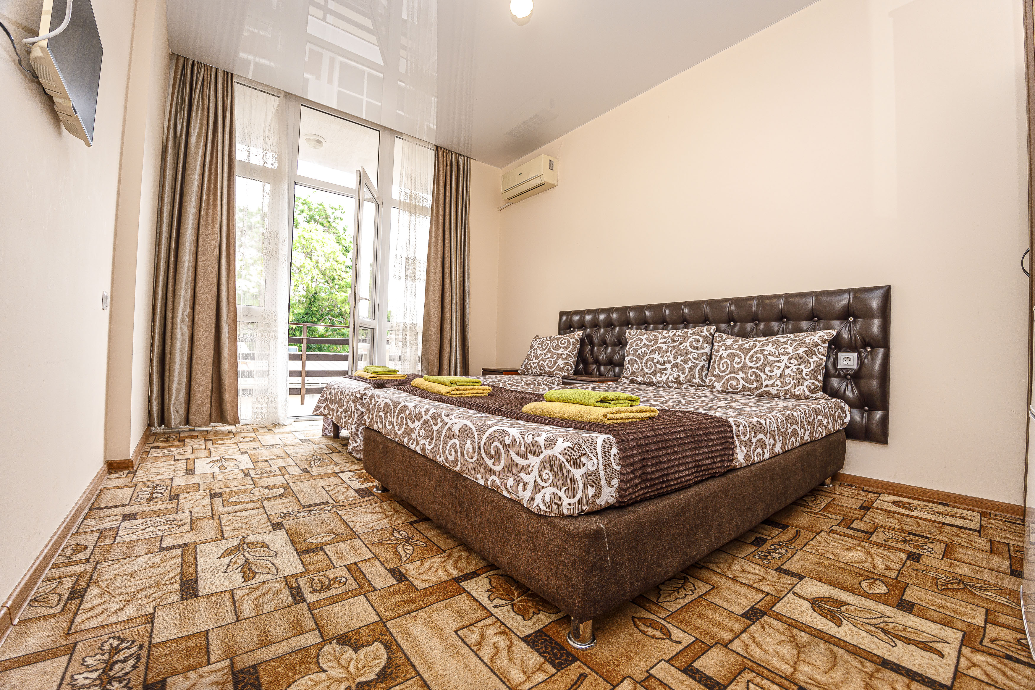 Трехместный номер с балконом