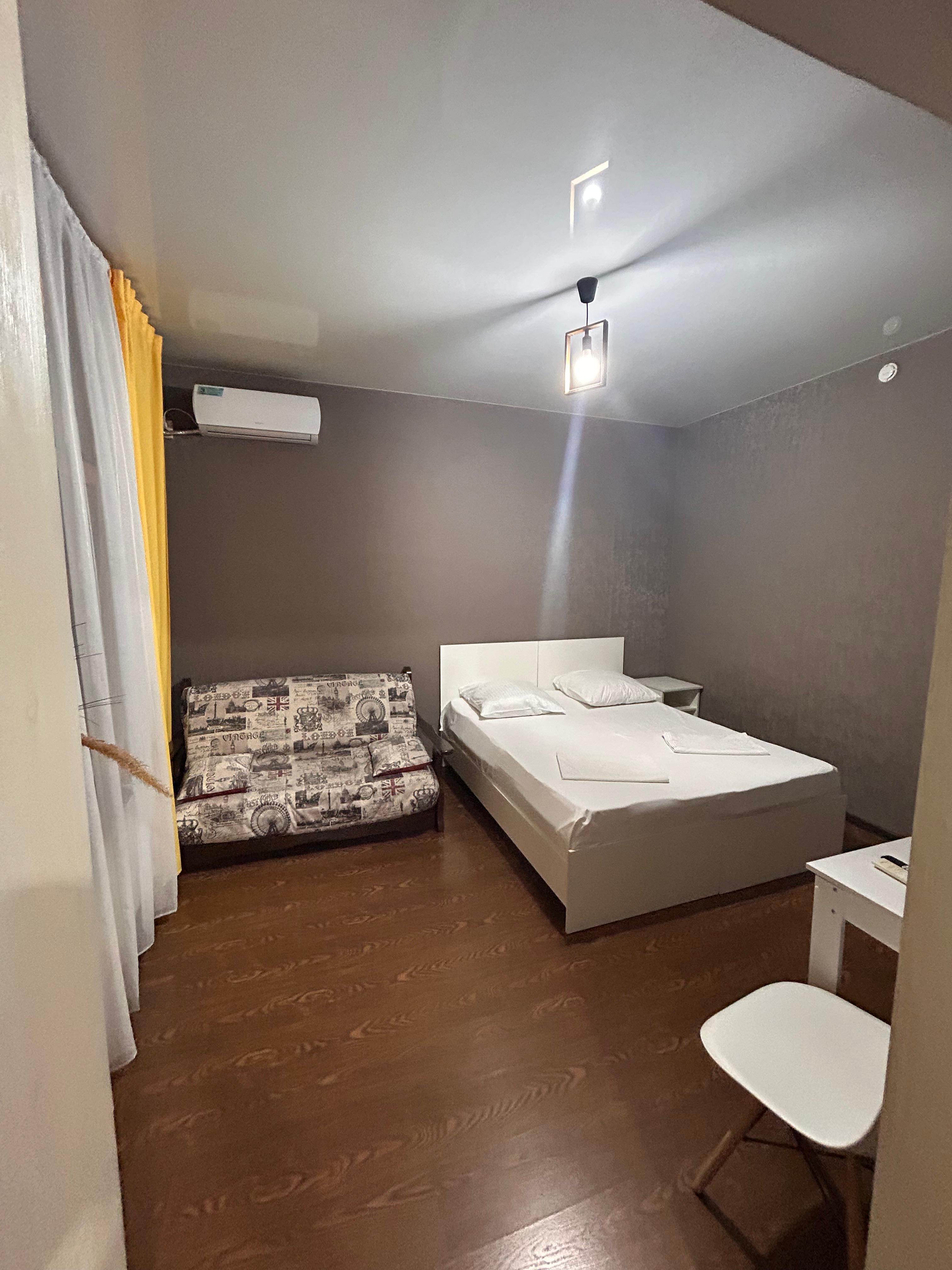 Трехместный номер с балконом