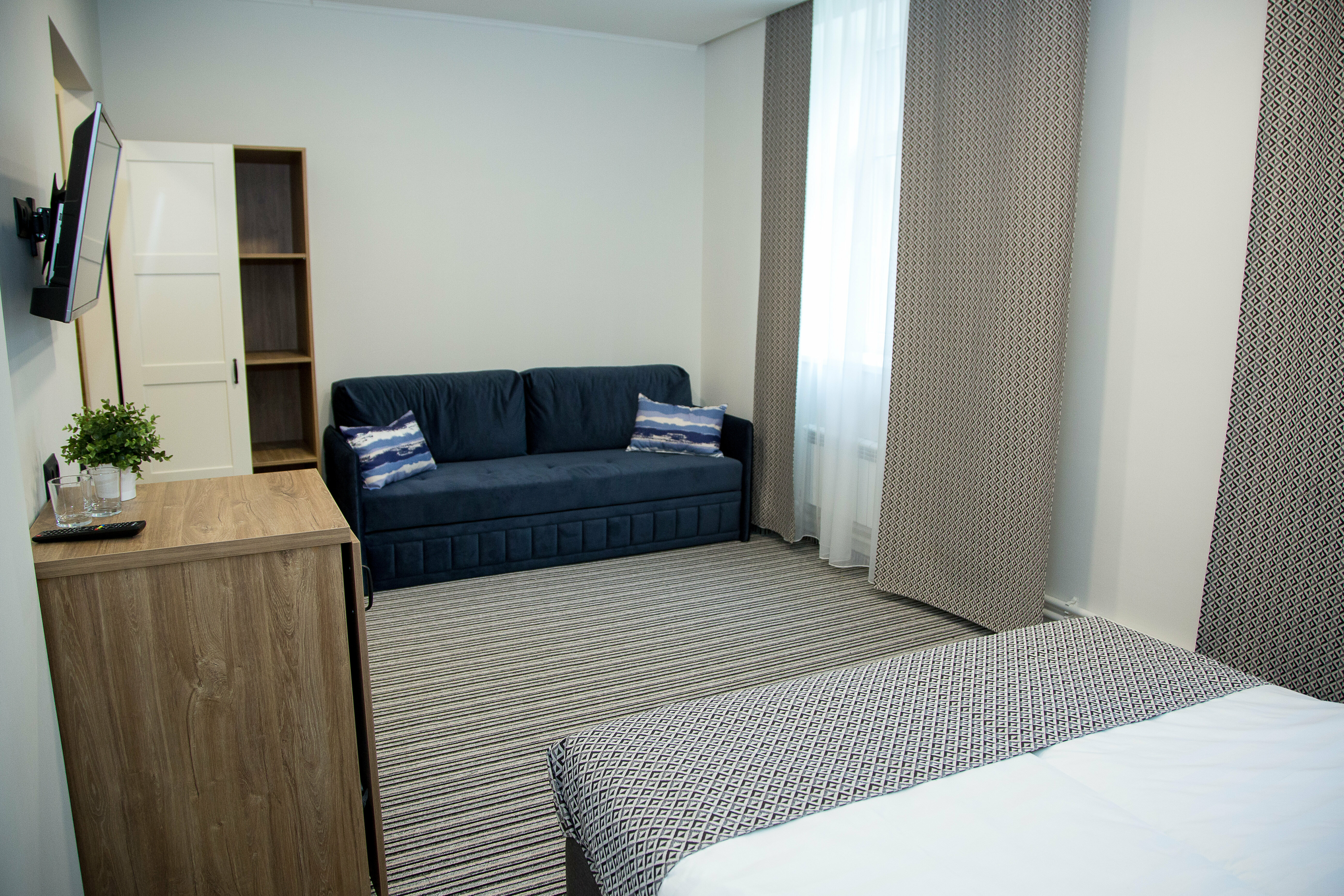 Улучшенный четырехместный номер