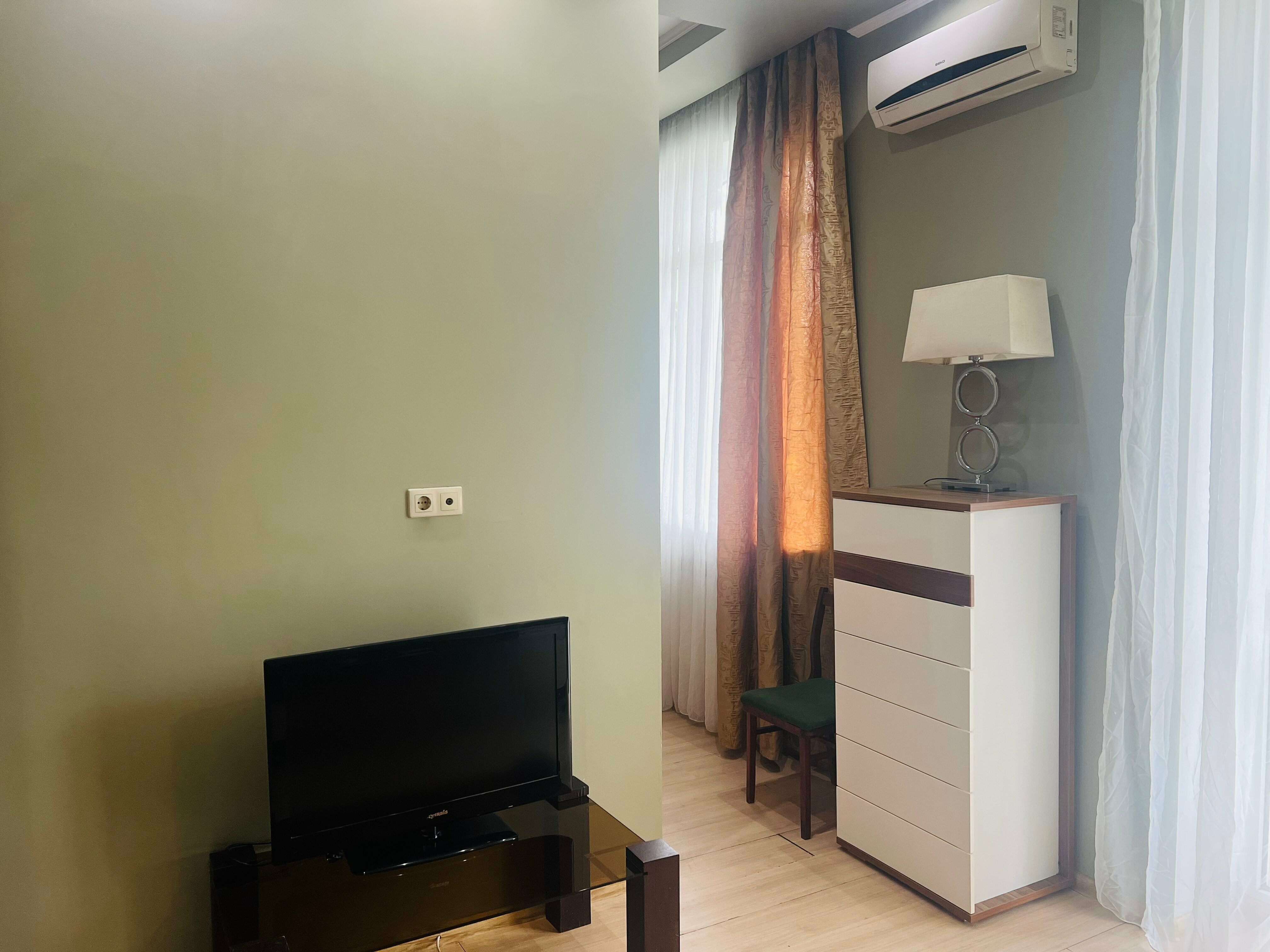 Трехместный номер с балконом