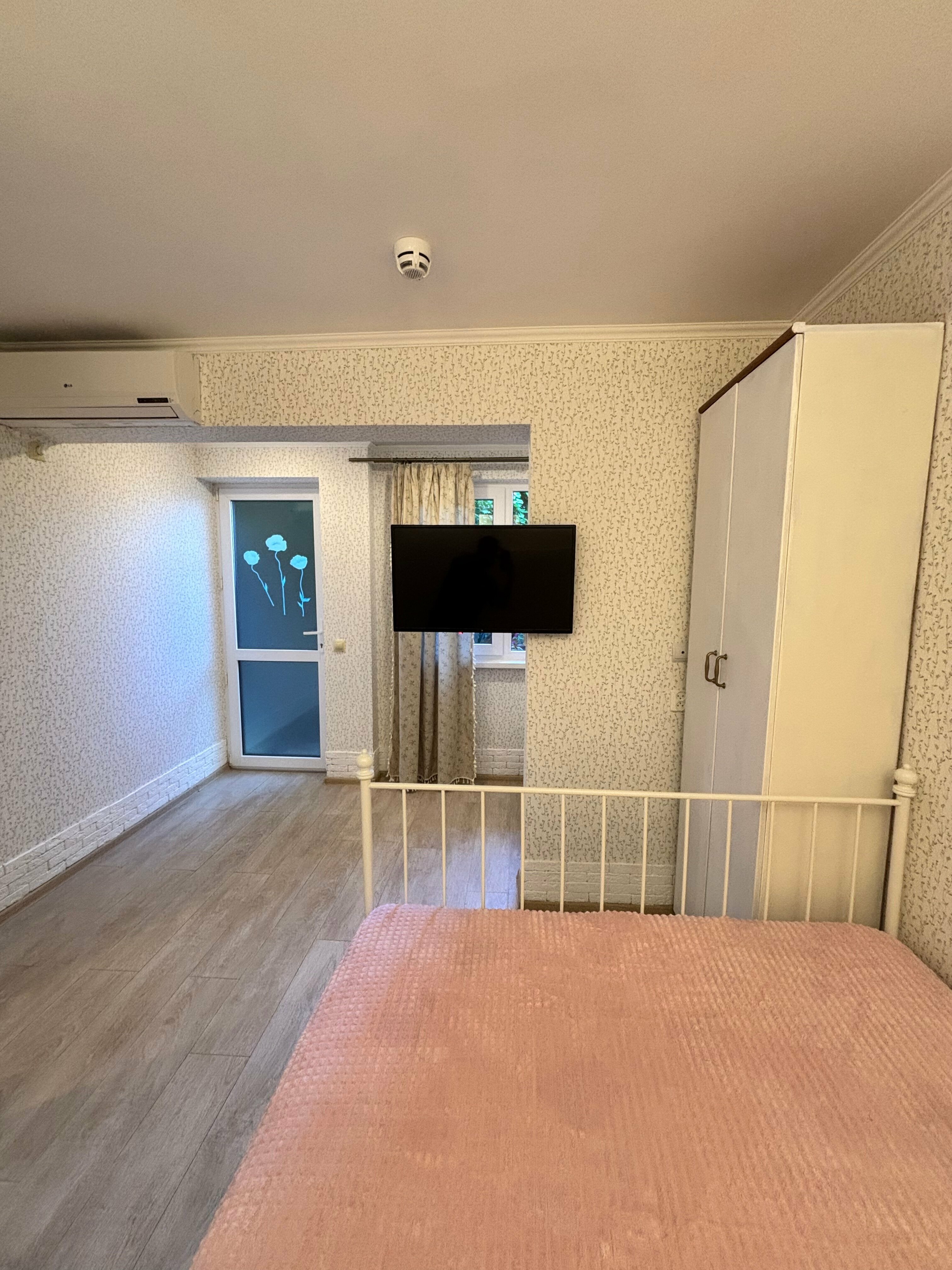 Трехместный номер с видом на сад