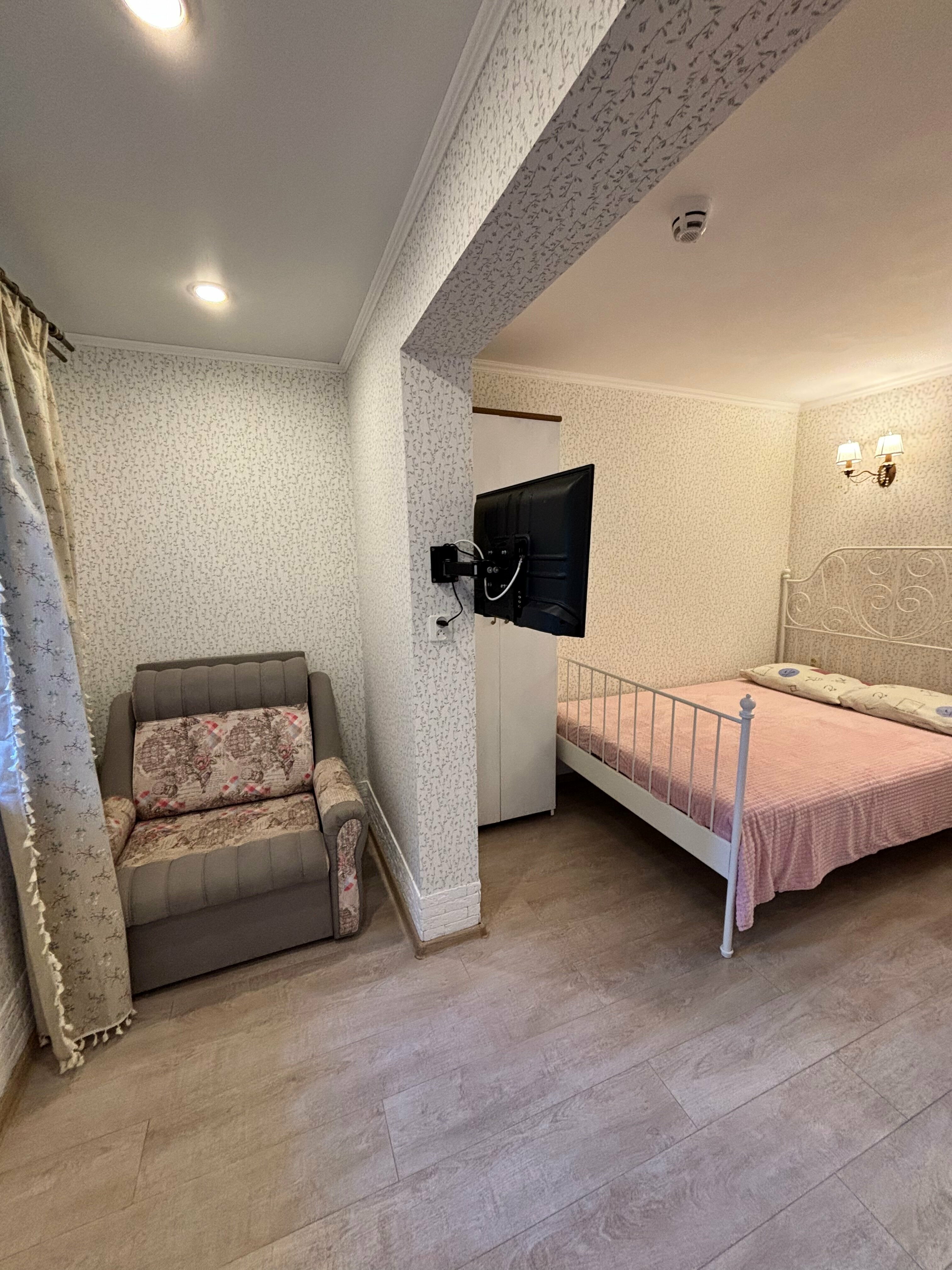 Трехместный номер с видом на сад