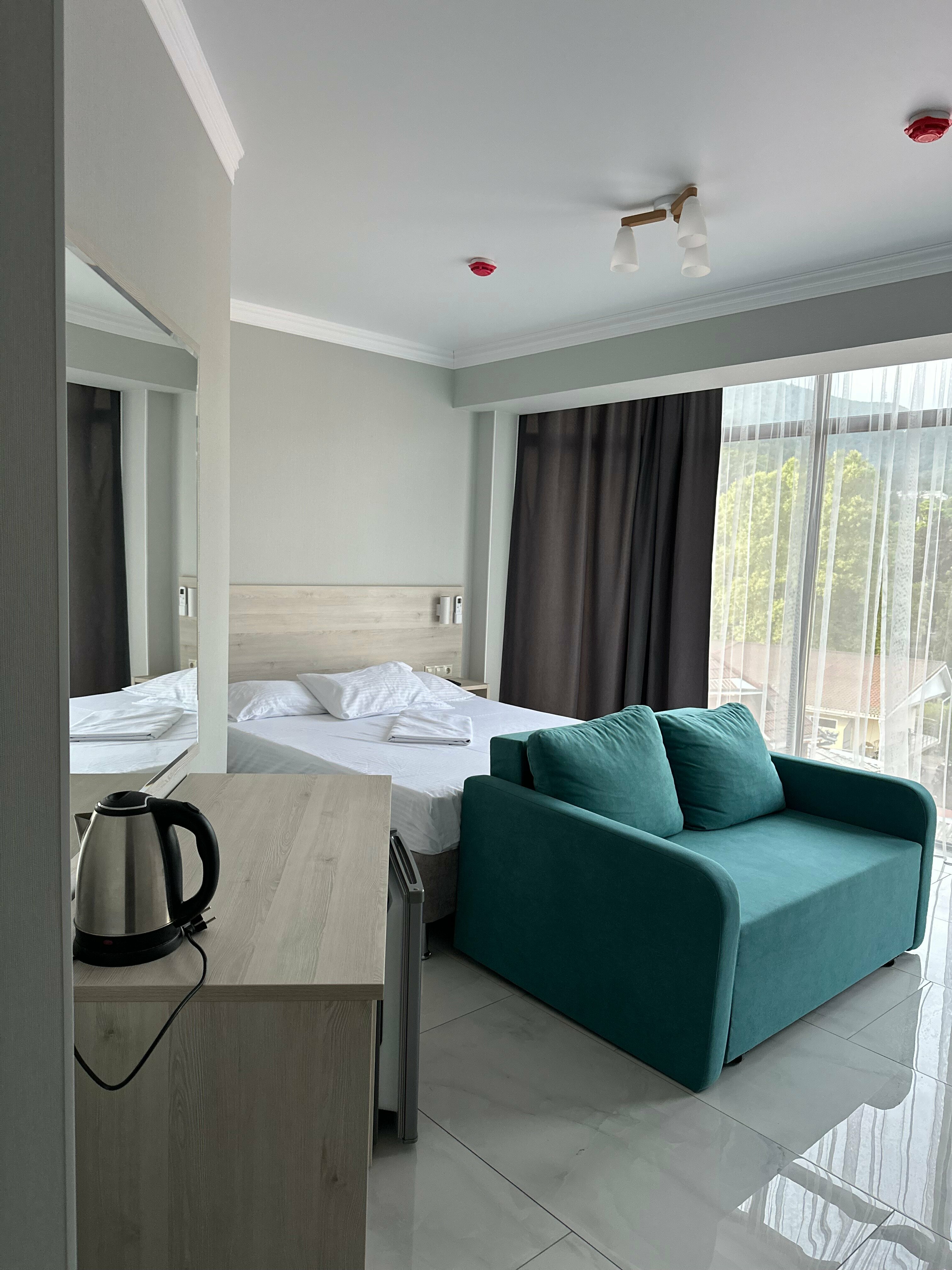 Трёхместный номер с доп.местом и балконом