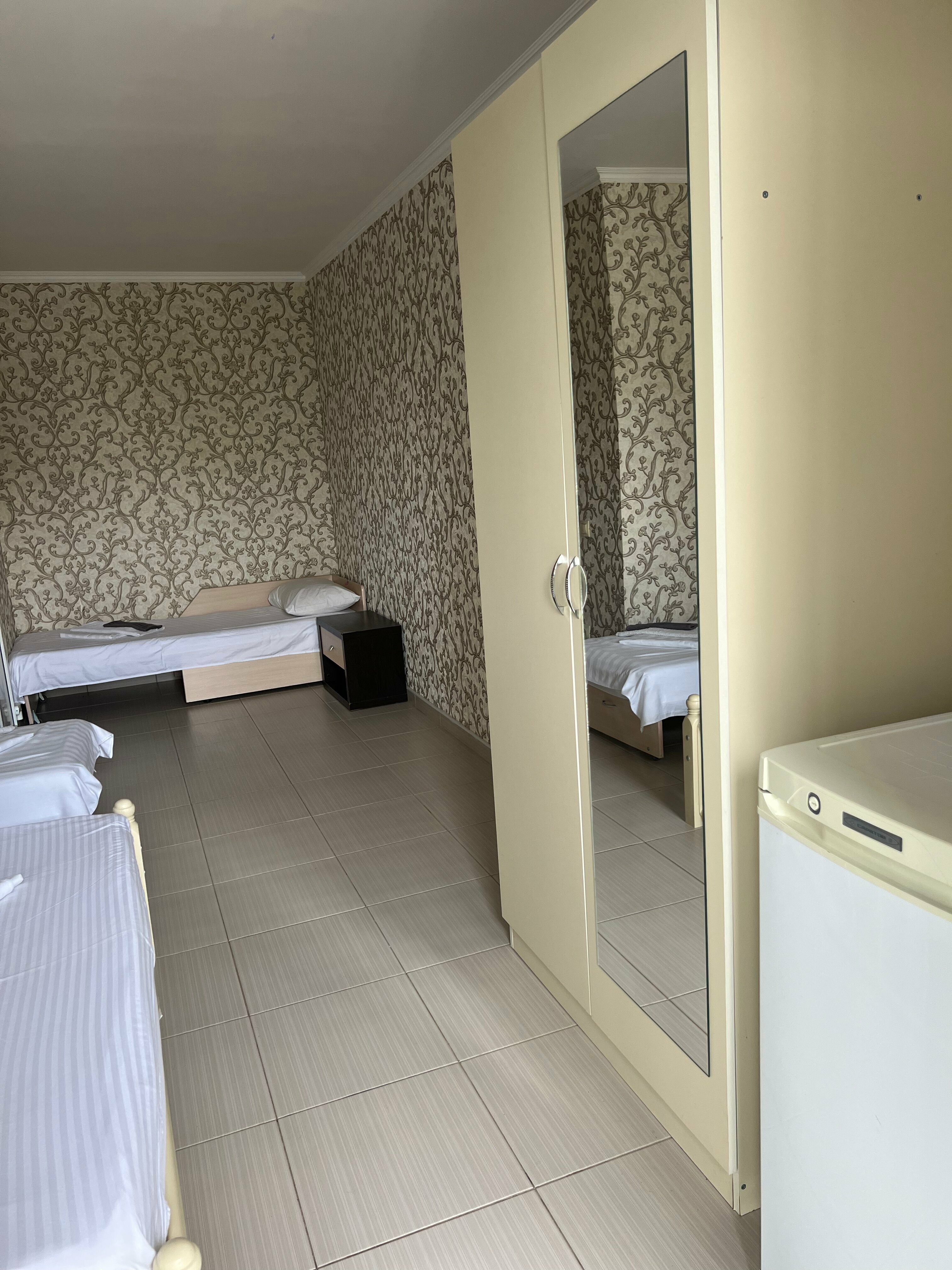 Улучшенный четырехместный номер