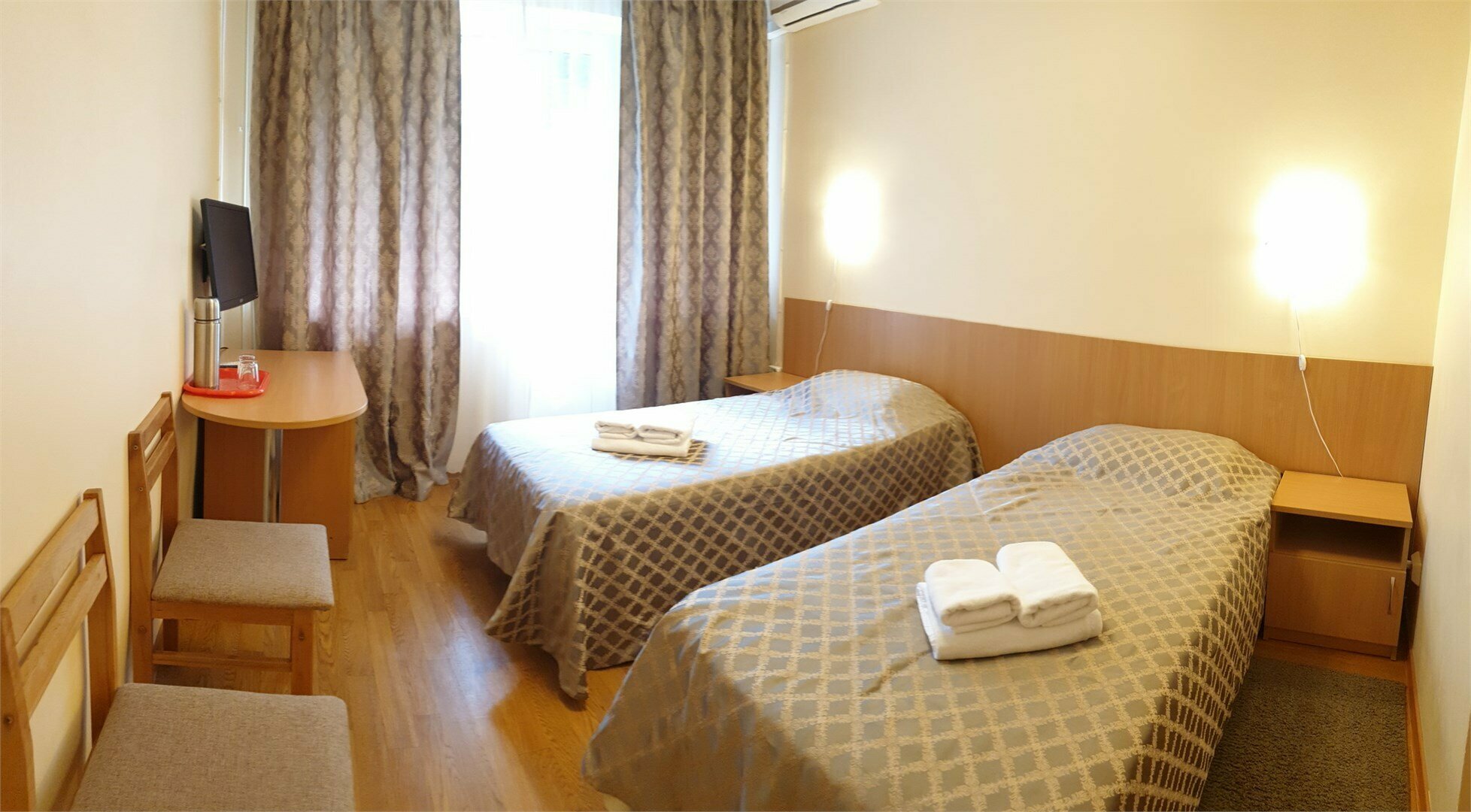 Двухместный номер с 2 двуспальными кроватями