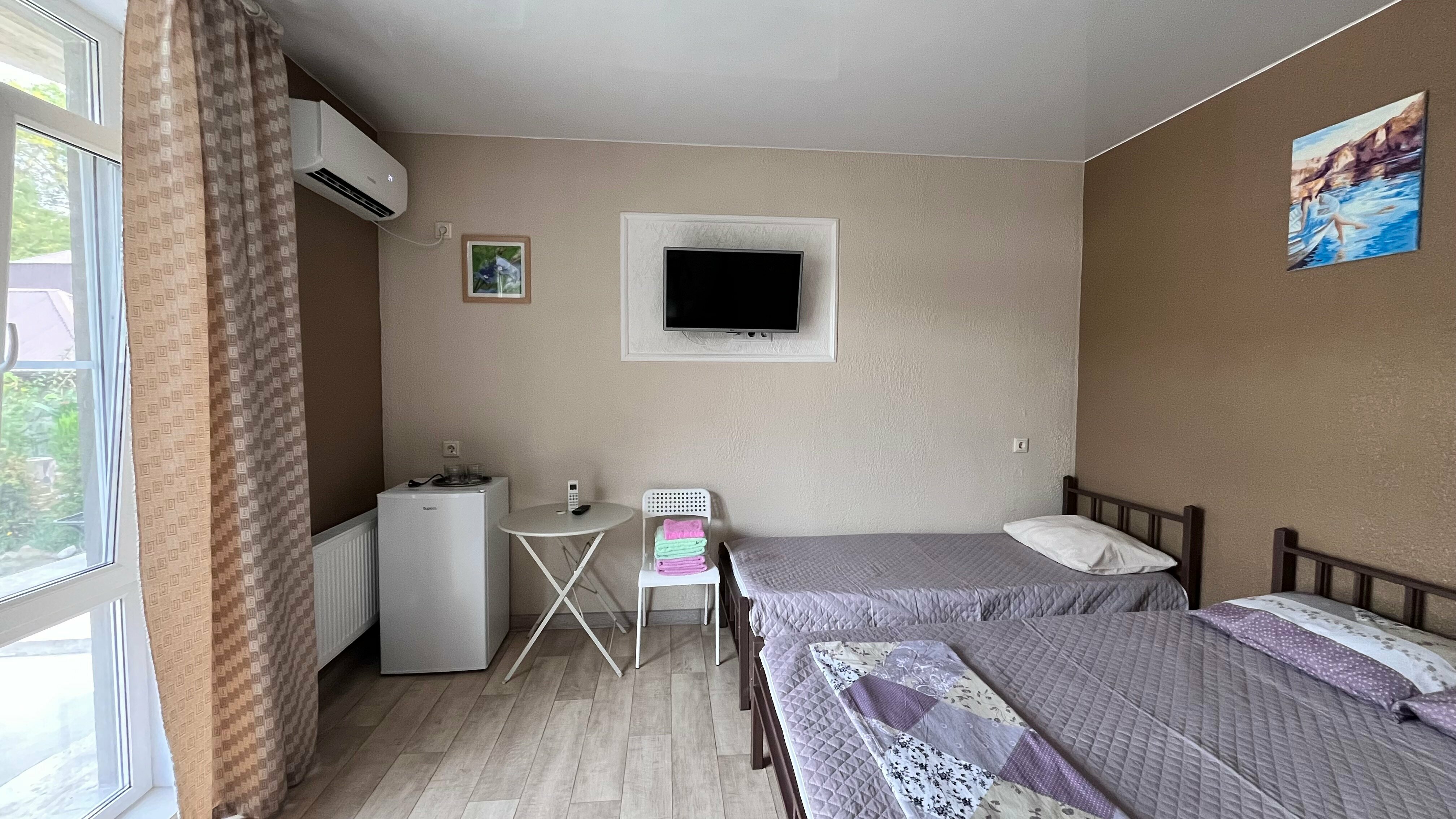 Улучшенный четырехместный номер