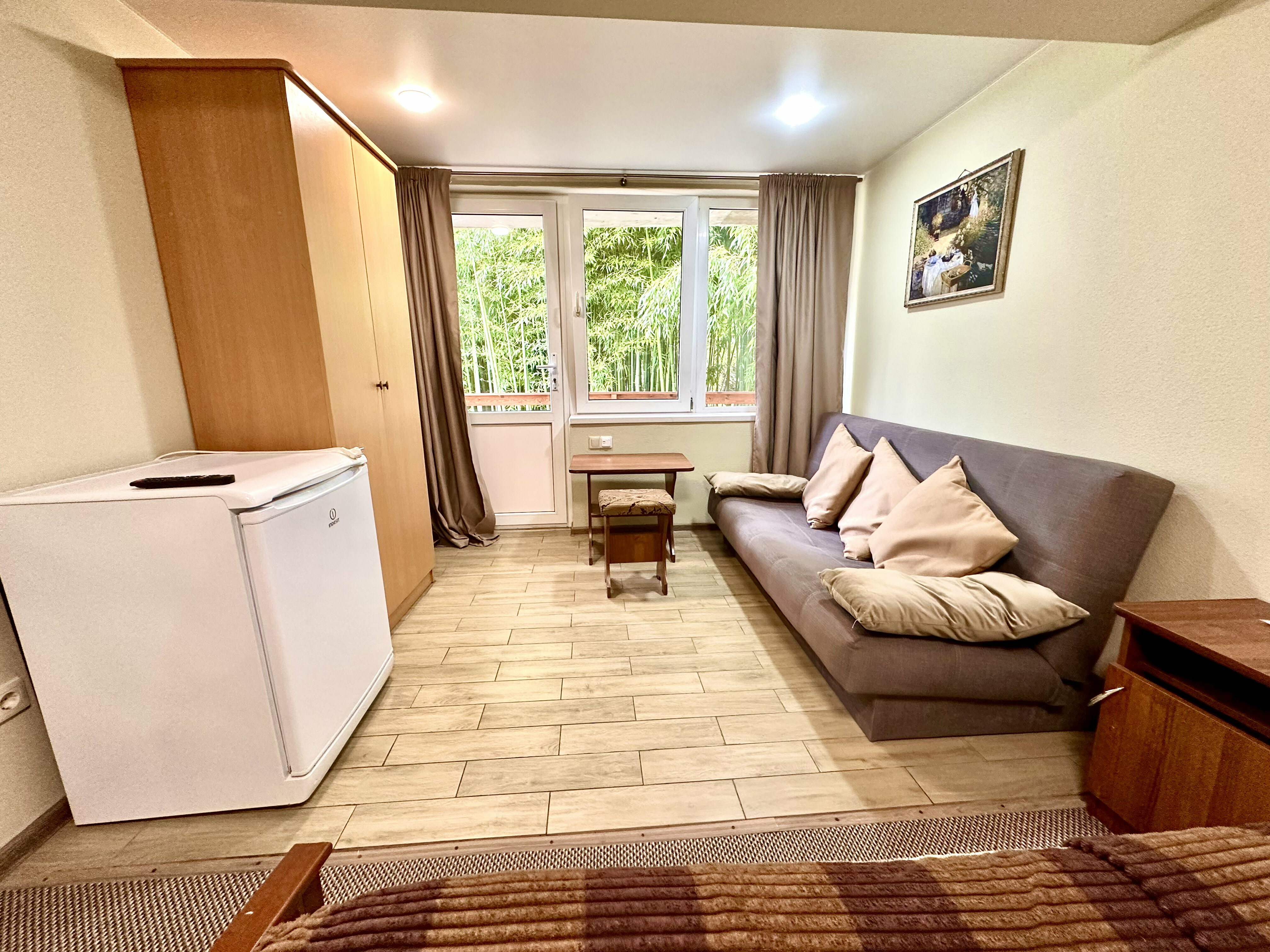 Четырехместный номер Комфорт с балконом